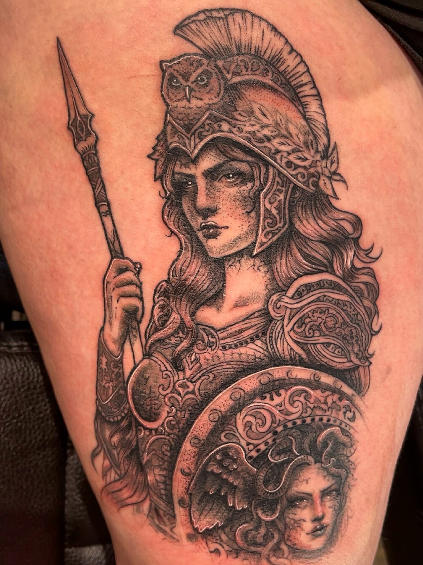 Female warrior with owl realism tattoo on the thigh by Elle Miller
