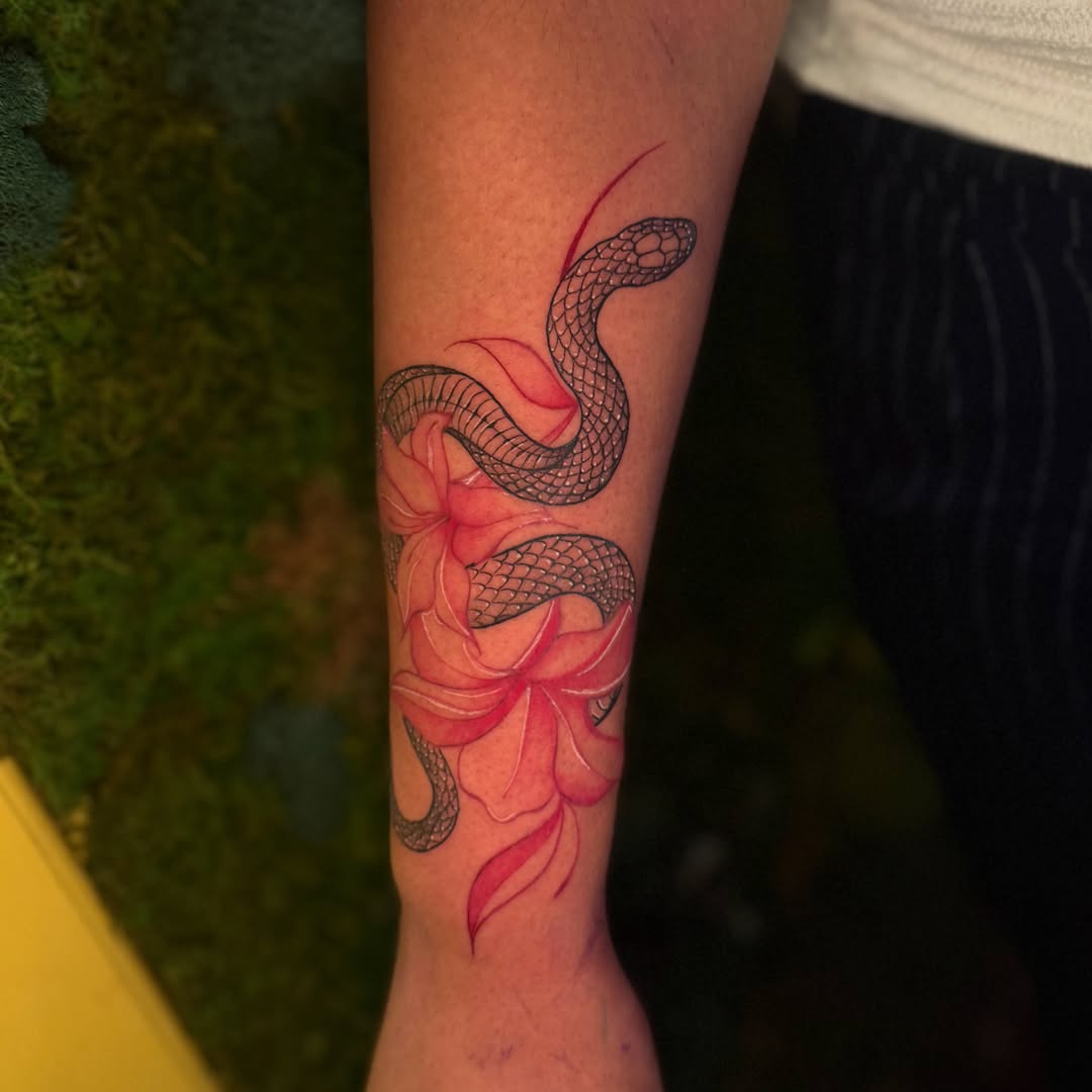 Snake and flower realism tattoo on the forearm by 🌸Cinthia ちゃん🌹, New York, New York