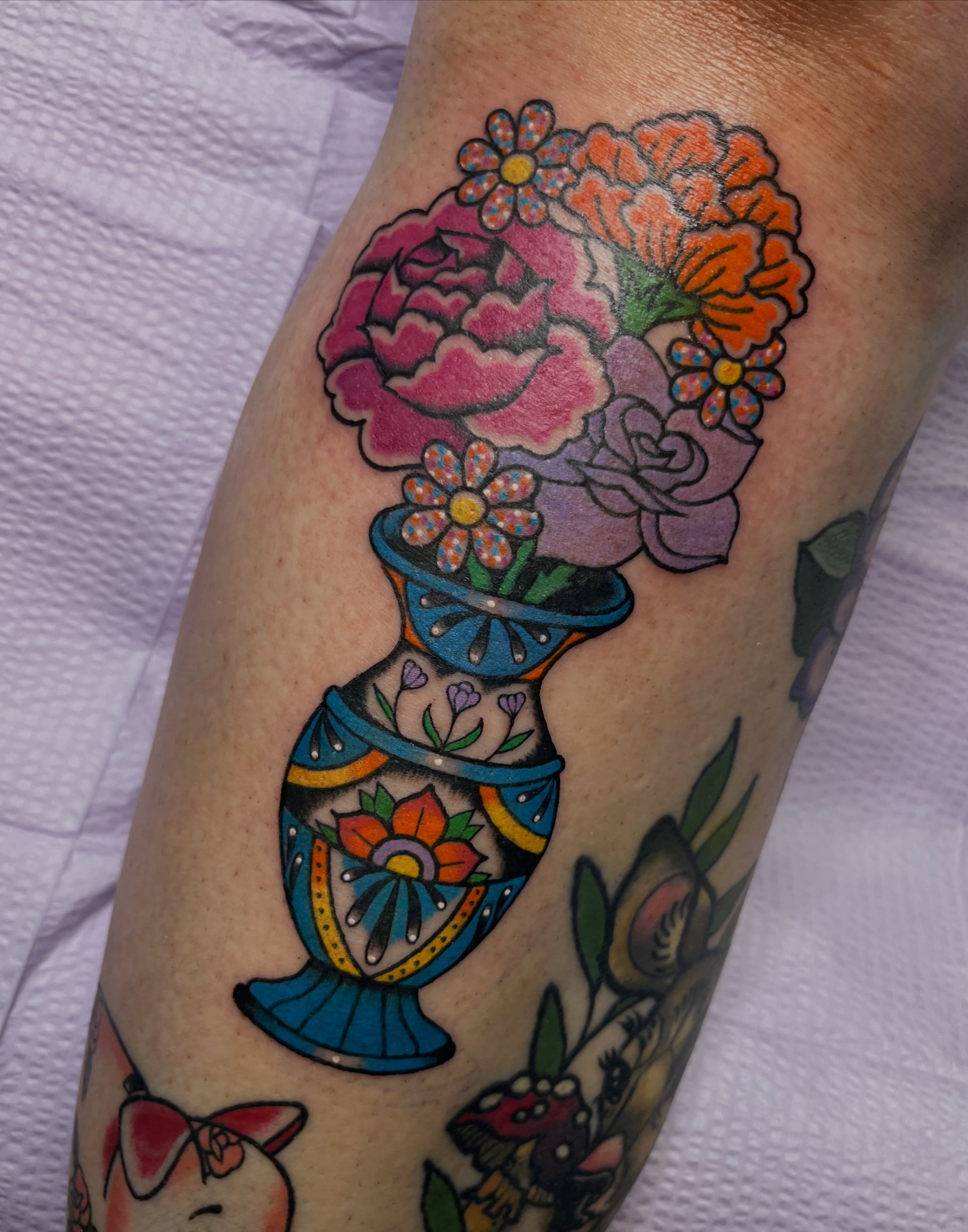 Flower arrangement American traditional tattoo on the forearm by Cincinnati Tattoo Artist, Cincinnati