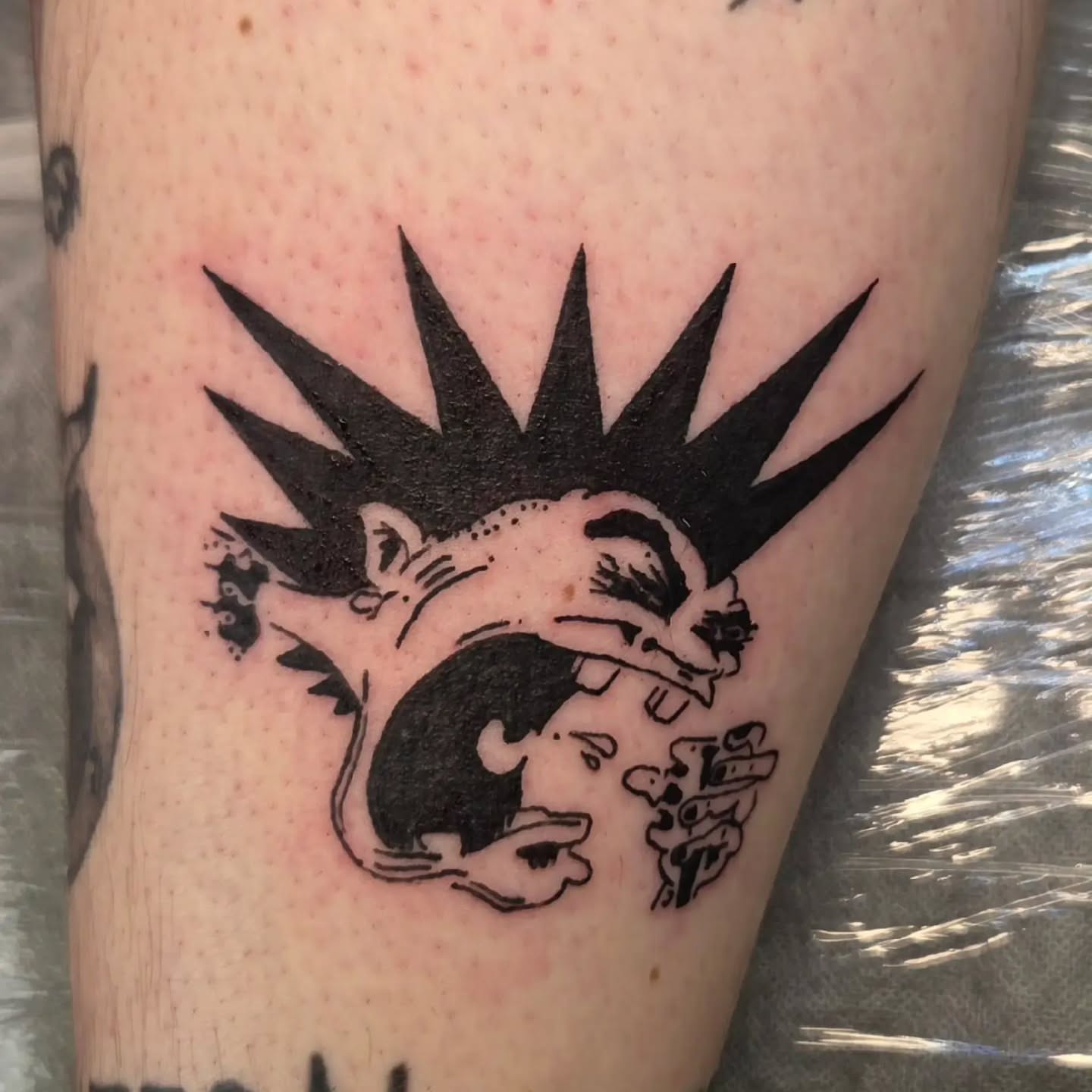 Mouse black and grey tattoo on the forearm by Mary