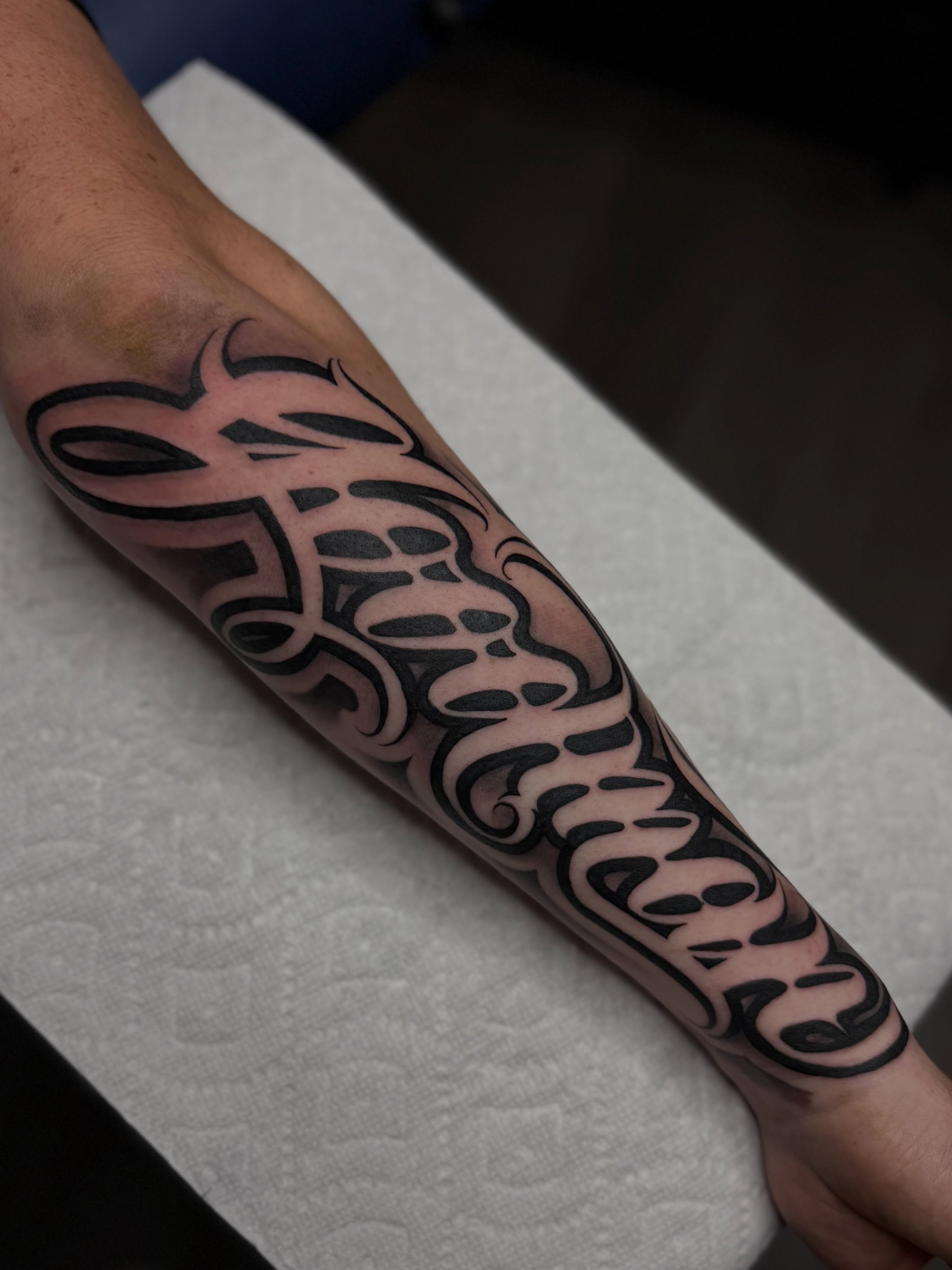Tribal pattern tribal tattoo on the forearm by Rocky G Inkz LLC