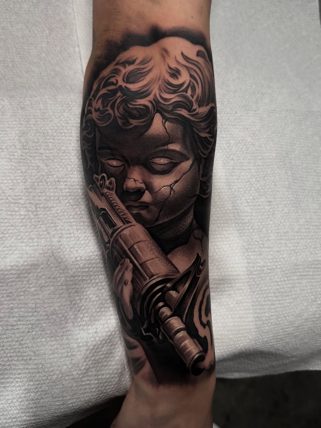 Tattoo by @eksoe_ — realism, black_and_grey