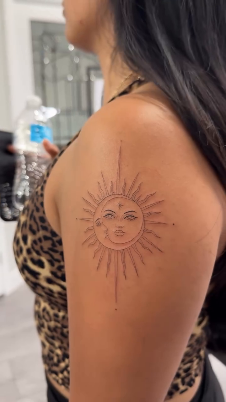 Sun and moon face ornamental tattoo on the leg by Jennifer Garcia R - Vegas tattoo artist