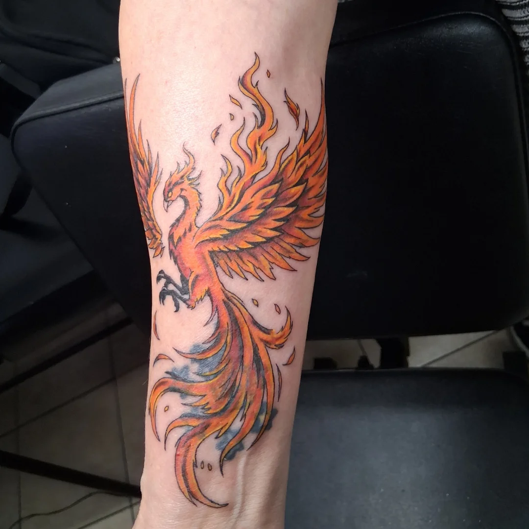 Phoenix neo-traditional tattoo on the forearm by Andrew j Ward, Whitman, Massachusetts
