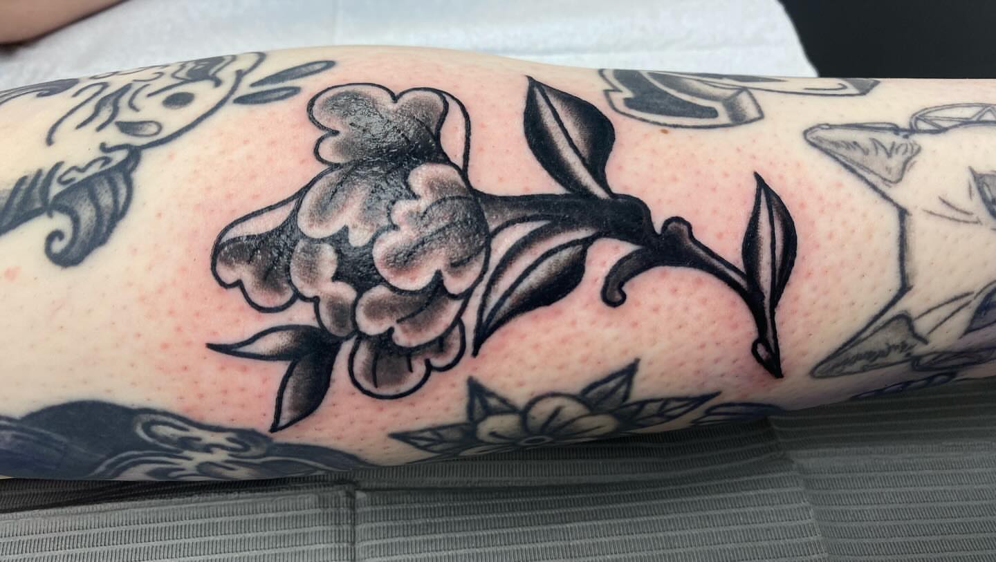 Tattoo by @meadowzmodificationz — black_and_grey