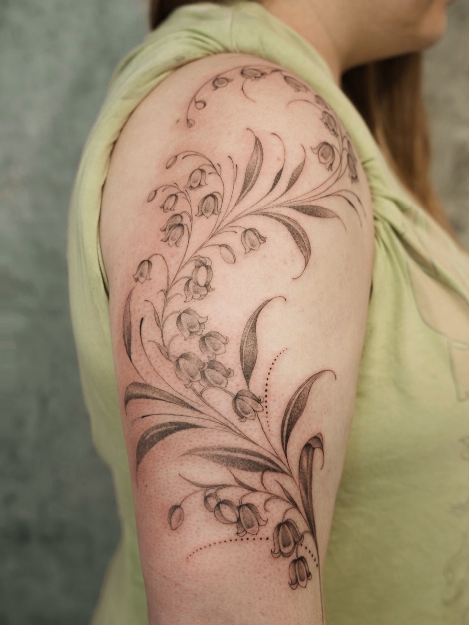 Lily of the valley floral fine line tattoo on the shoulder by 𝕁𝕖𝕞, Richmond, British Columbia