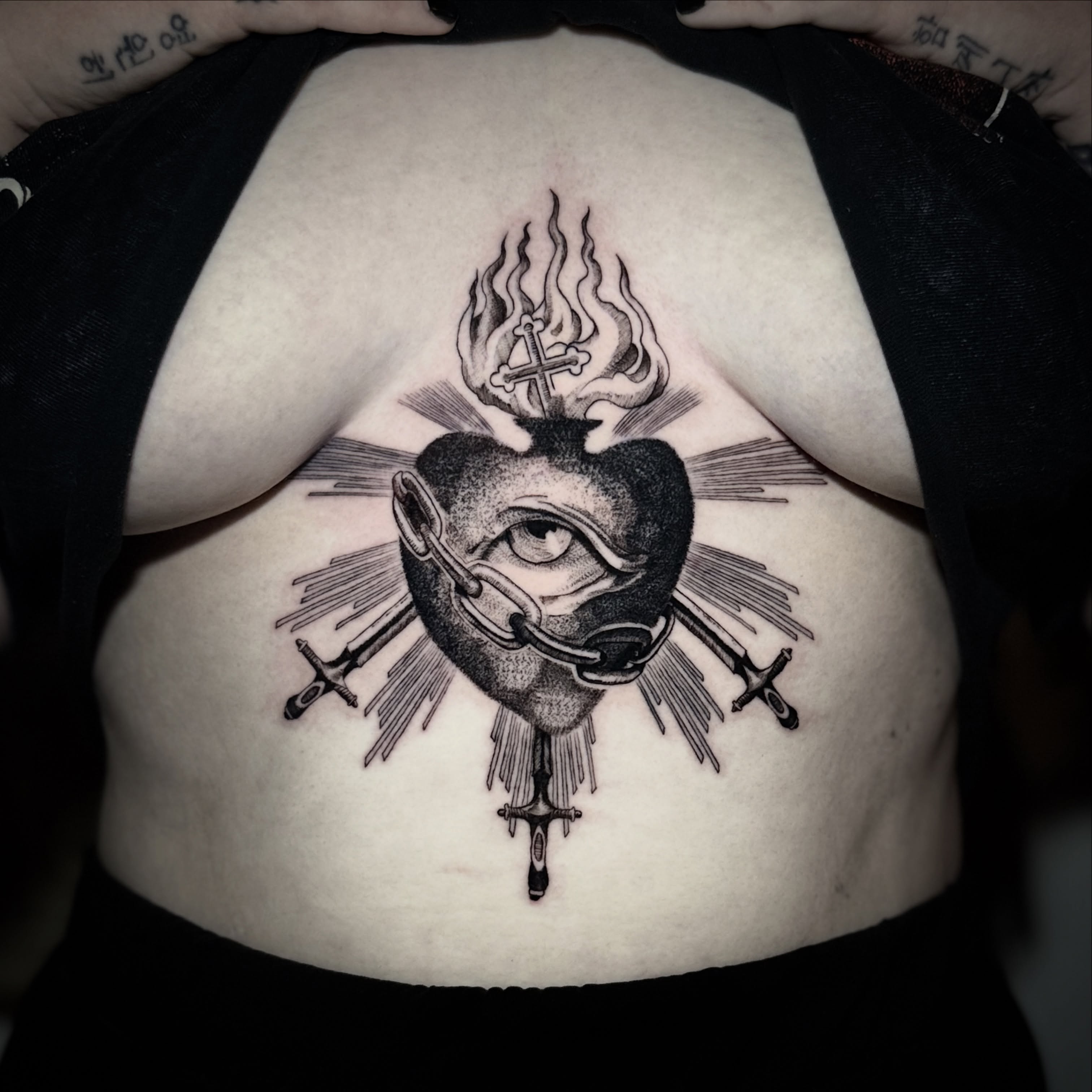 Heart with cross and flames black and grey tattoo on the torso by † Aileen † Chicago Tattoo Artist