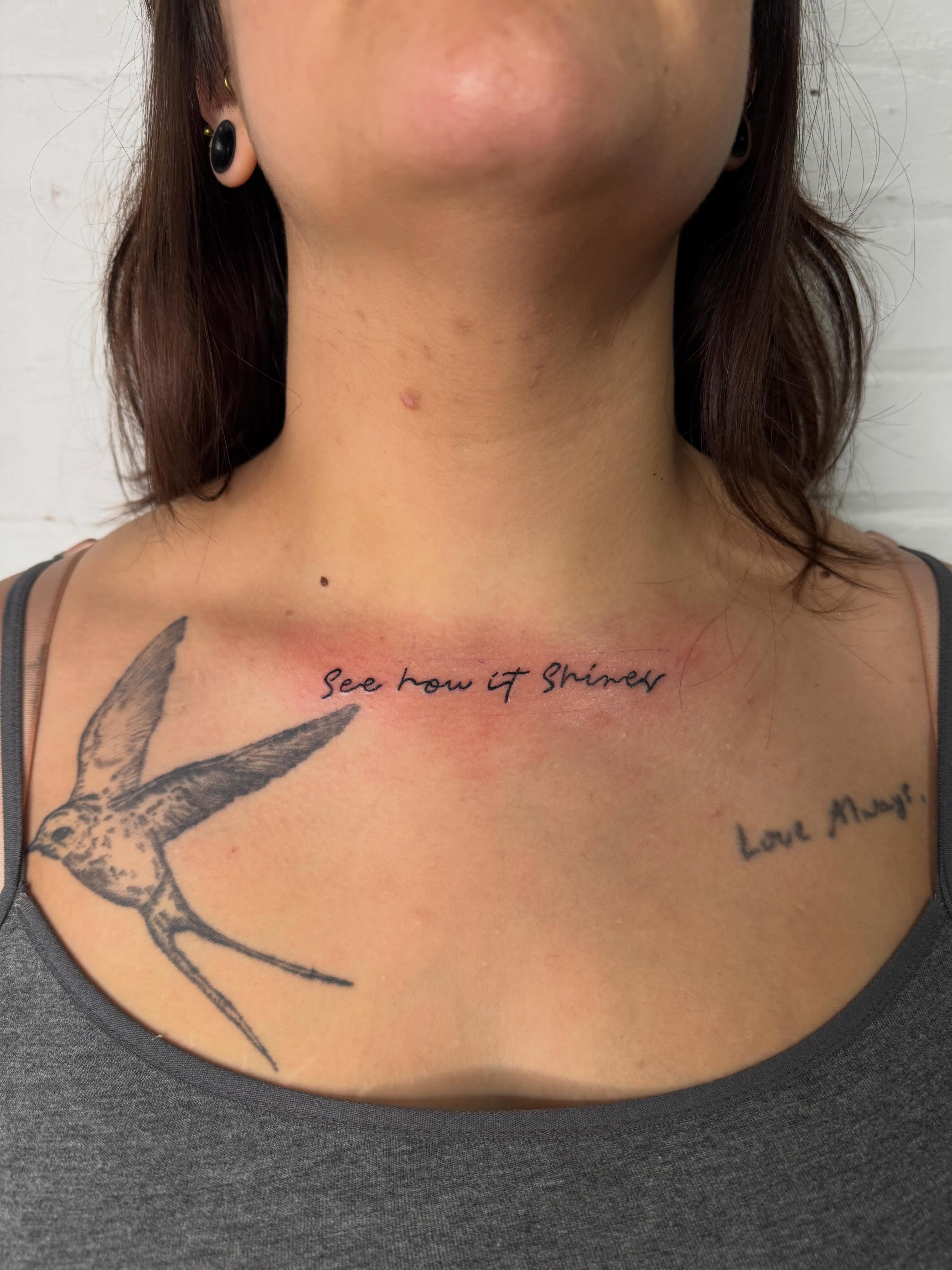 Bird and quote black and grey tattoo on the chest by Dennis Patterson