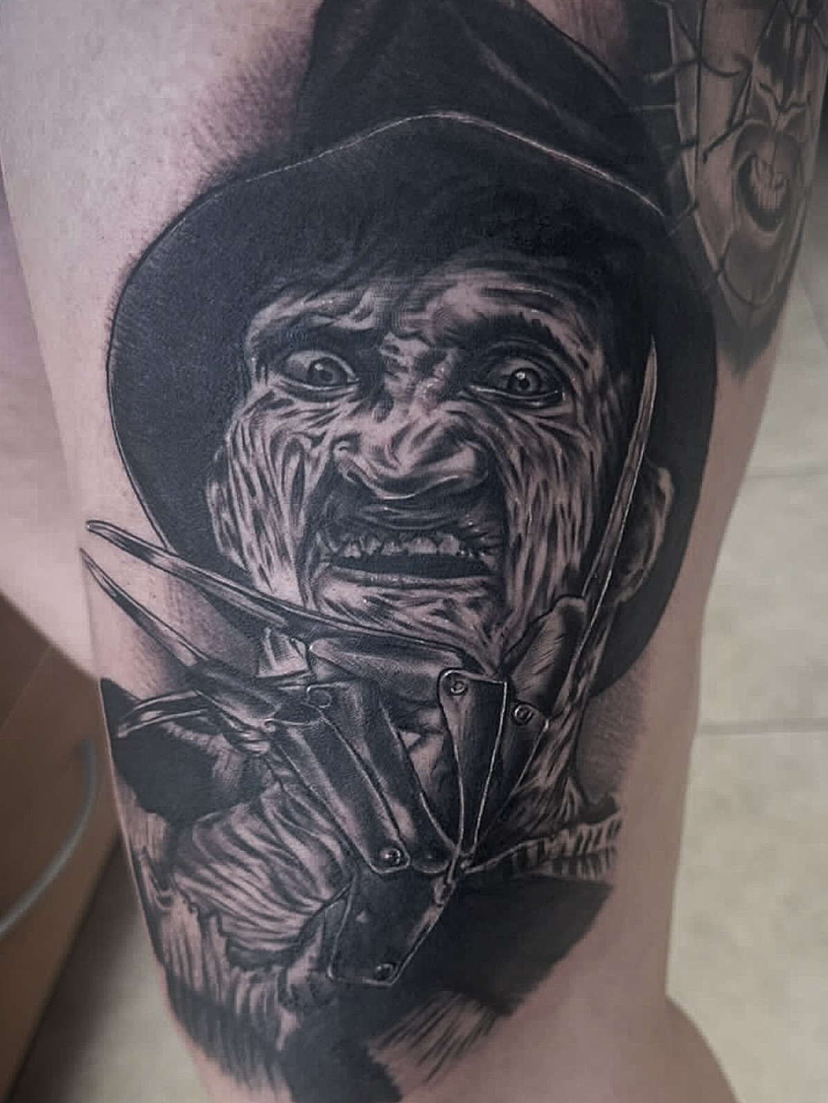 Freddy Krueger realism tattoo on the forearm by ⠀⠀ ⠀ ⠀ ⠀⠀ ⠀⠀ ⠀⠀ ⠀ ⠀⠀ ⠀⠀ᎪᎳᏃ, West Hollywood, California