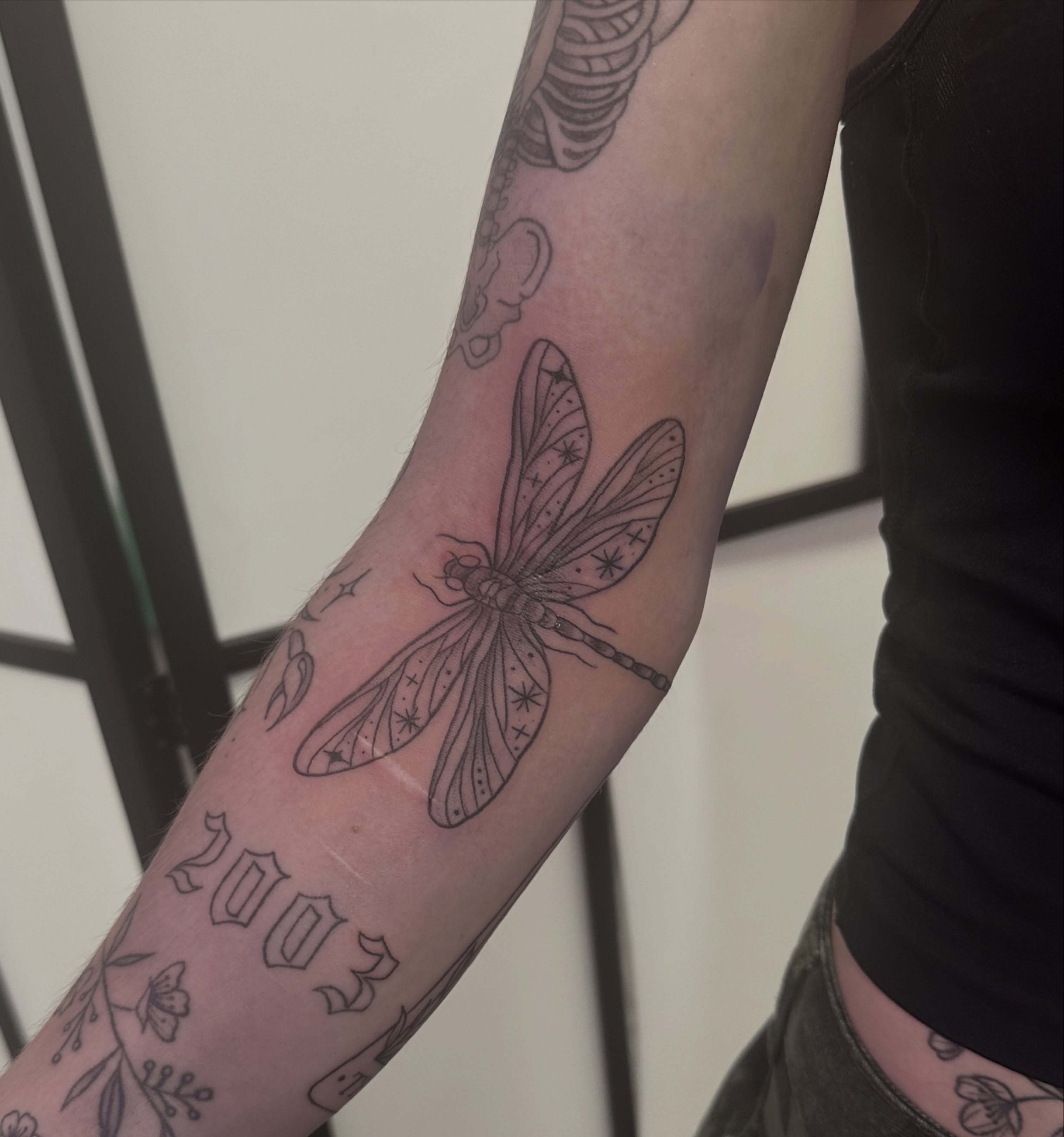 Tattoo by @meg.the.cyclopz_ — black_and_grey