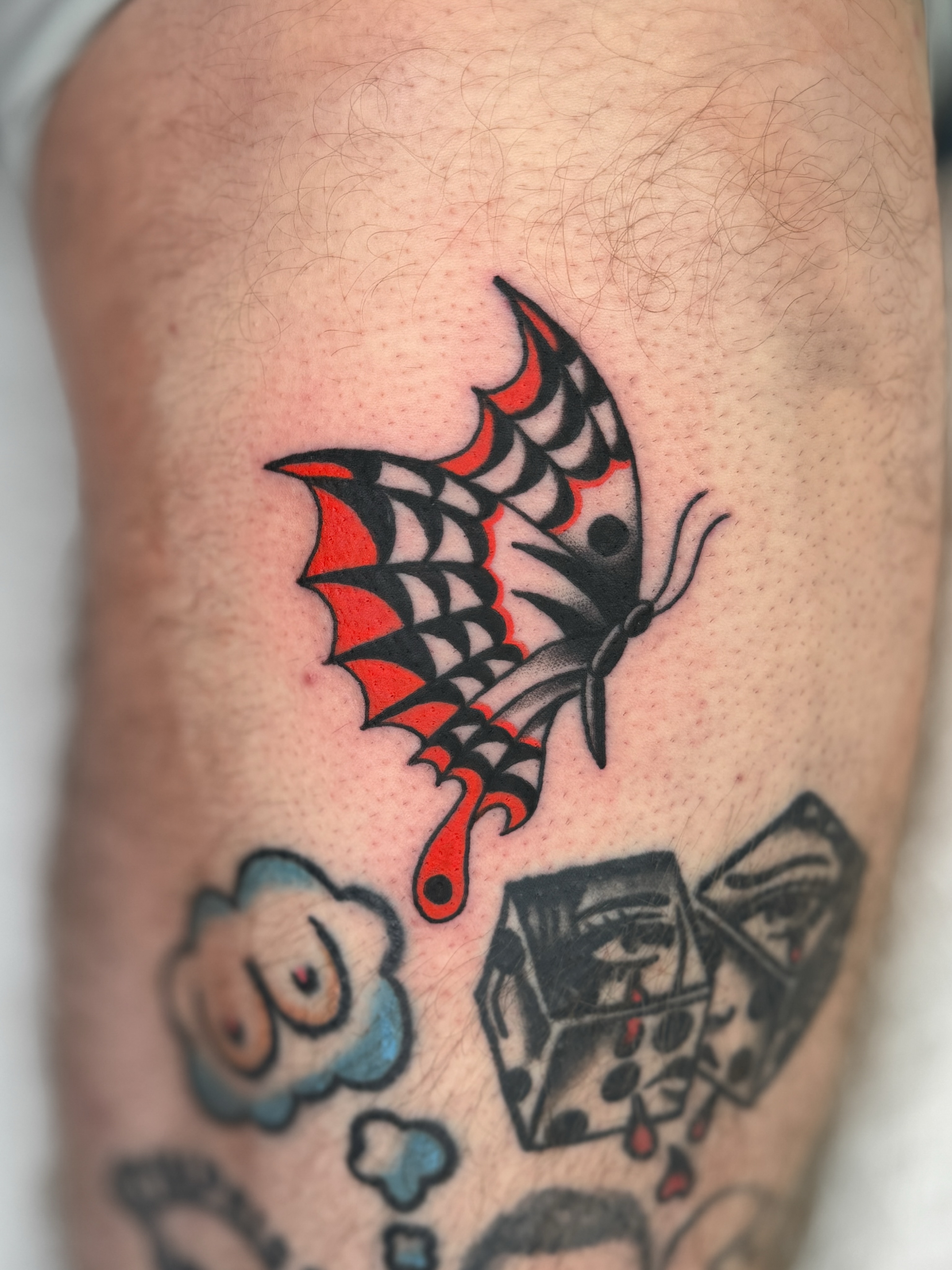 Bat American traditional tattoo on the forearm by Allie Barringer