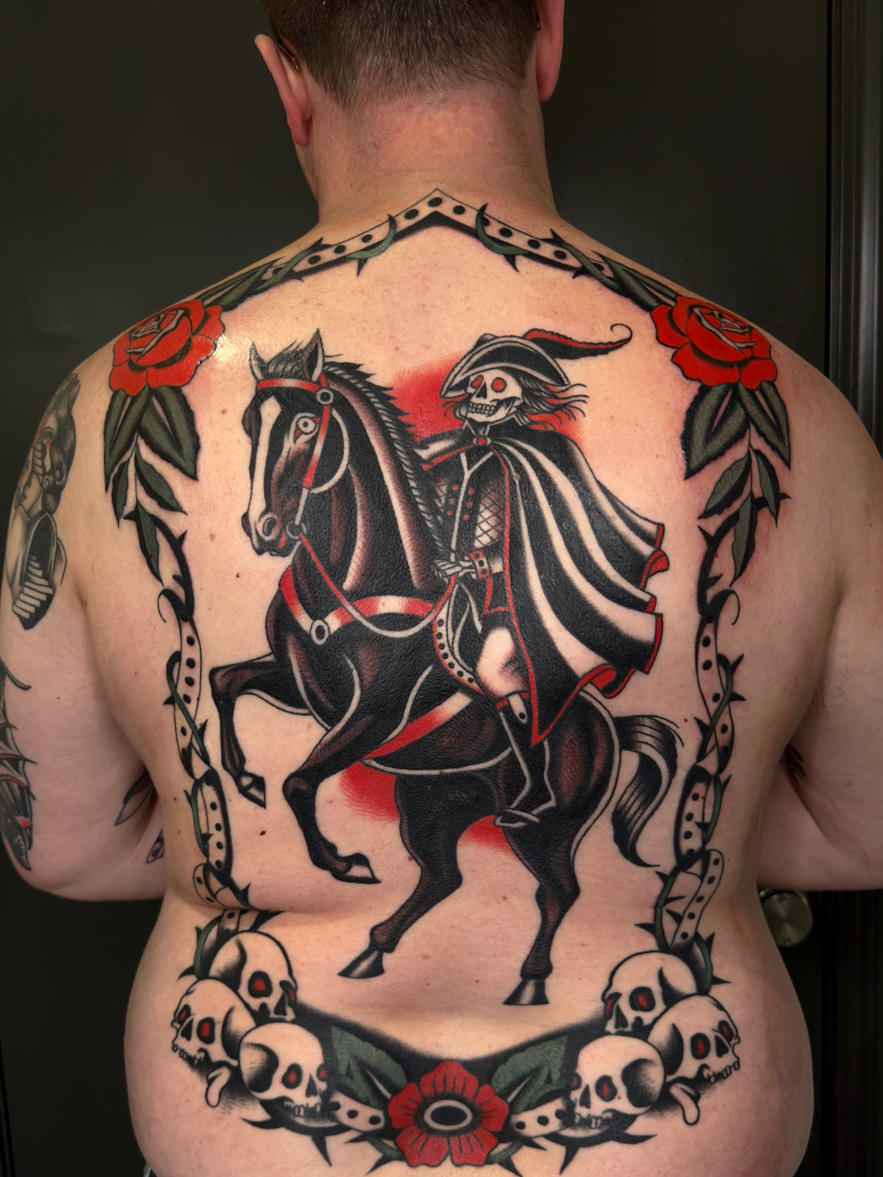 Pirate on horseback American traditional tattoo on the back by Allie Barringer