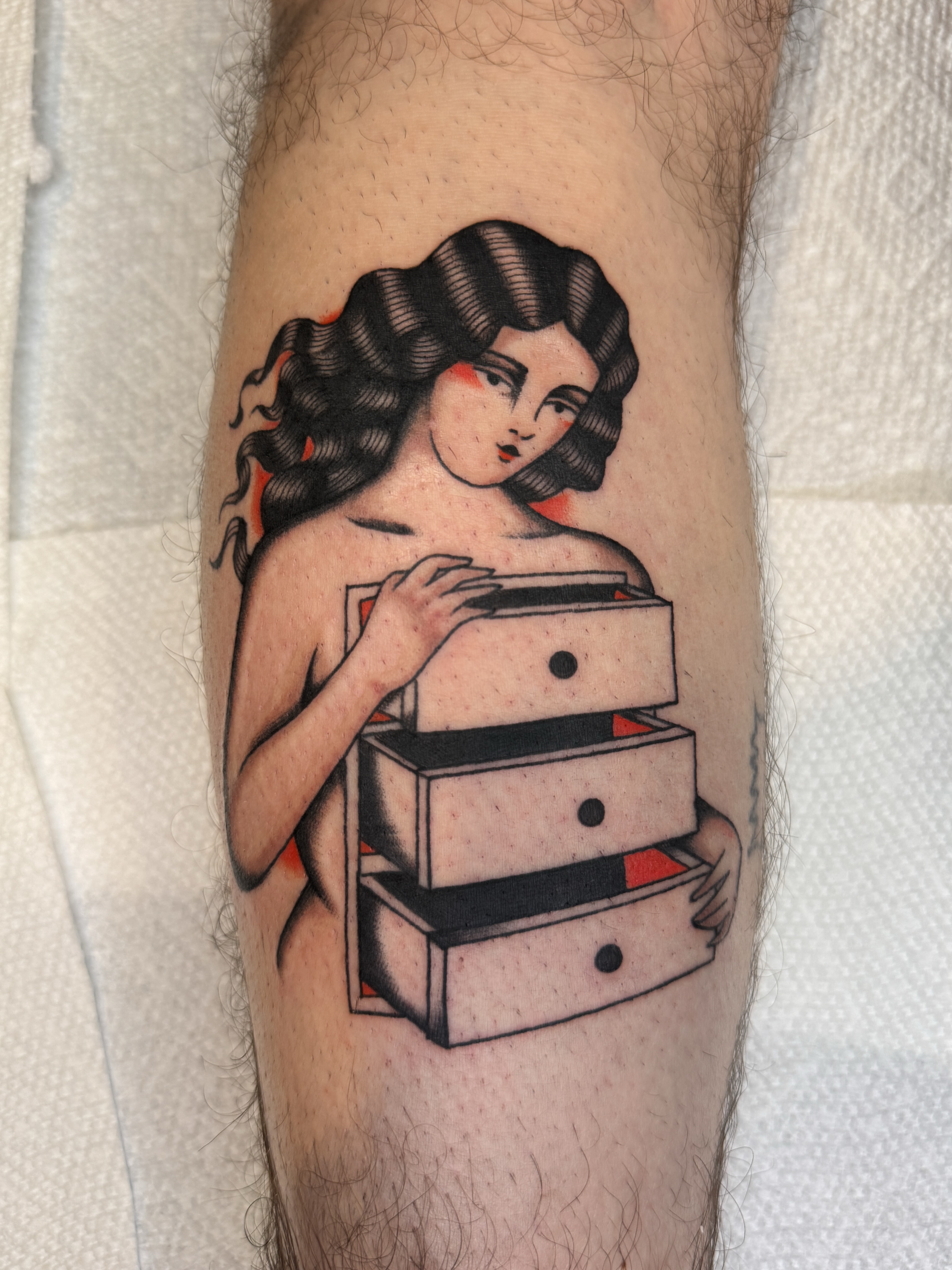 Woman with drawers American traditional tattoo on the forearm by Allie Barringer