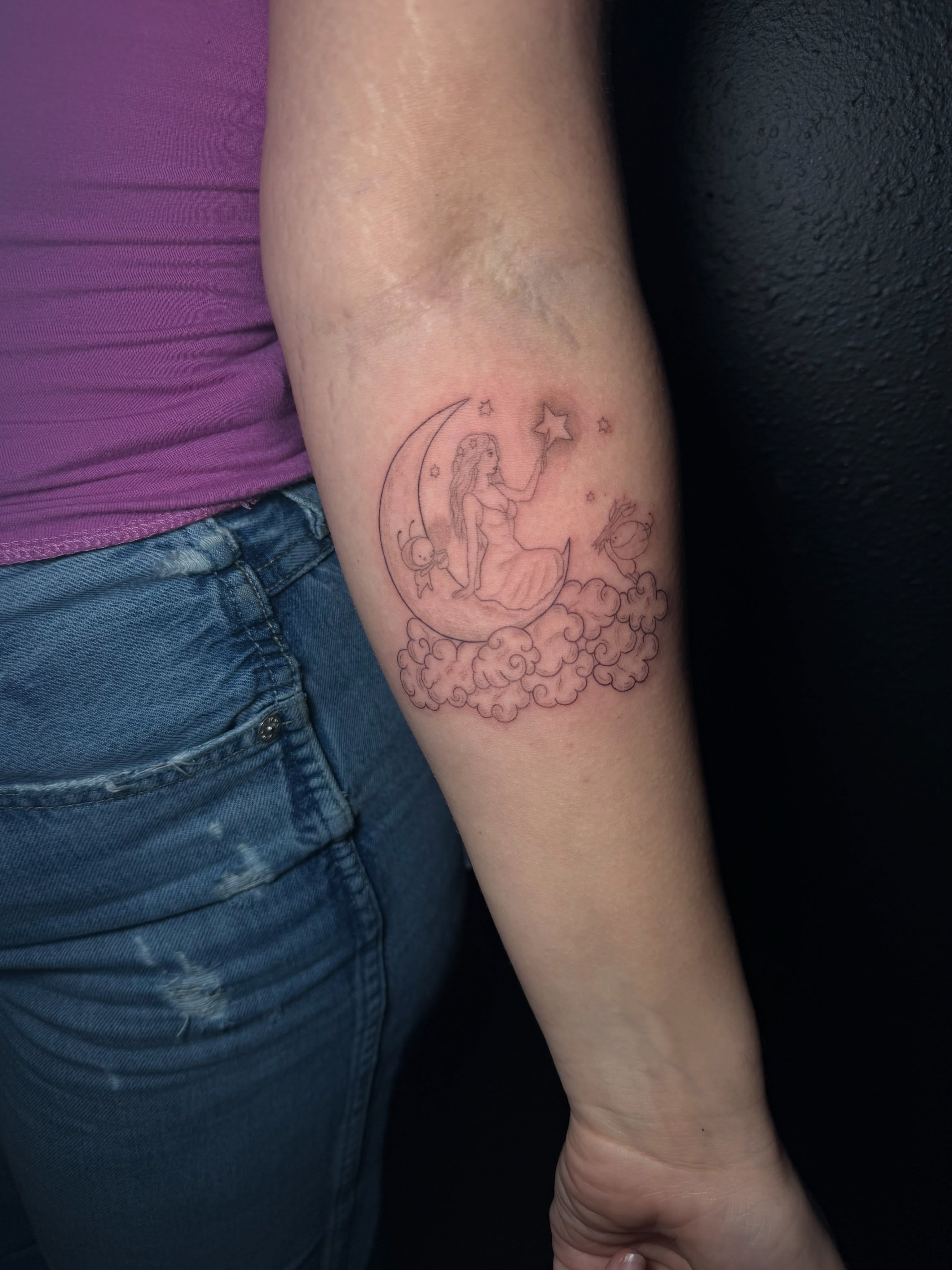 Woman on moon American traditional tattoo on the forearm by Ink Darling, Carlisle, Iowa