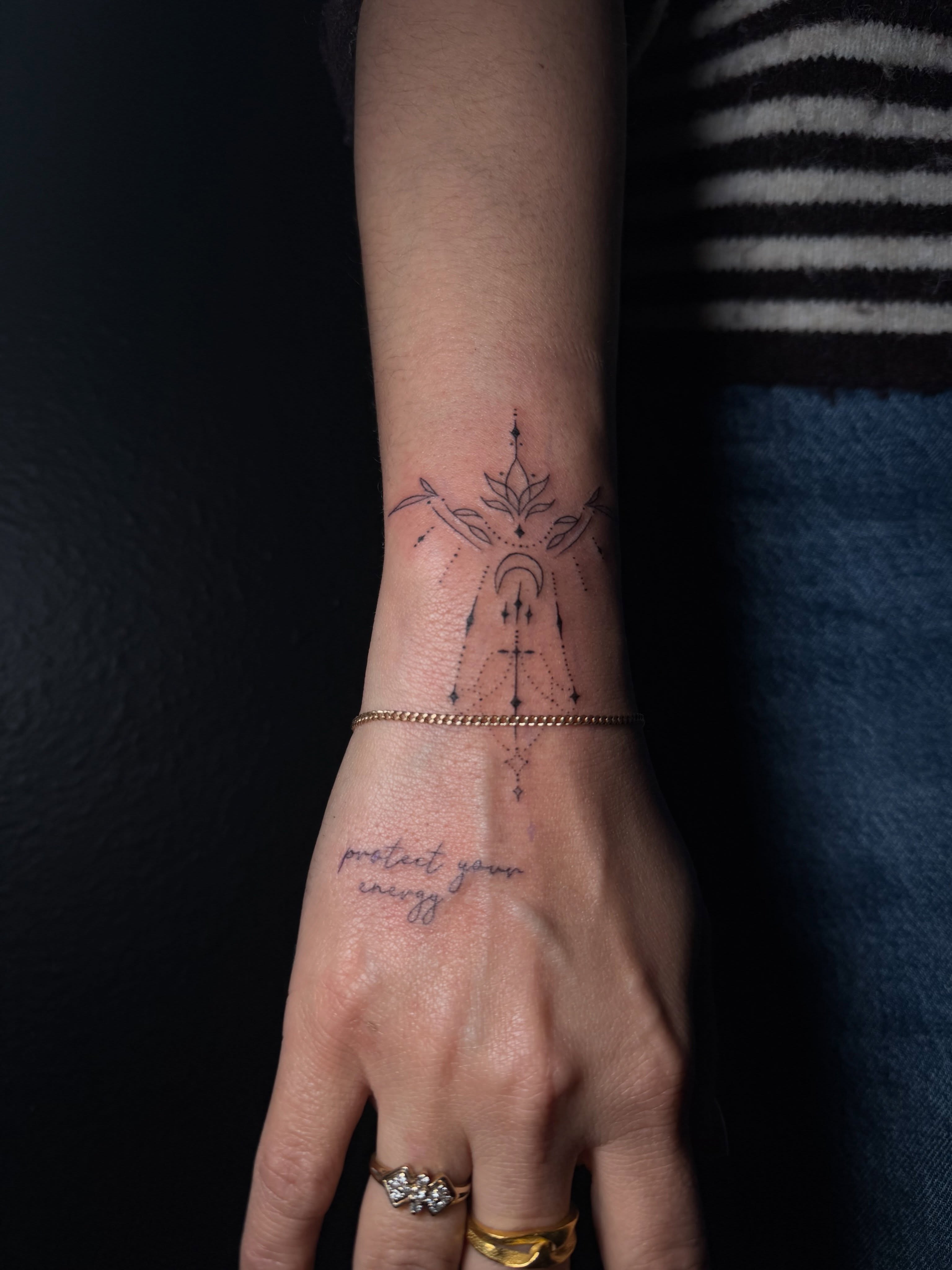 Geometric design fine line tattoo on the forearm by Ink Darling, Carlisle, Iowa