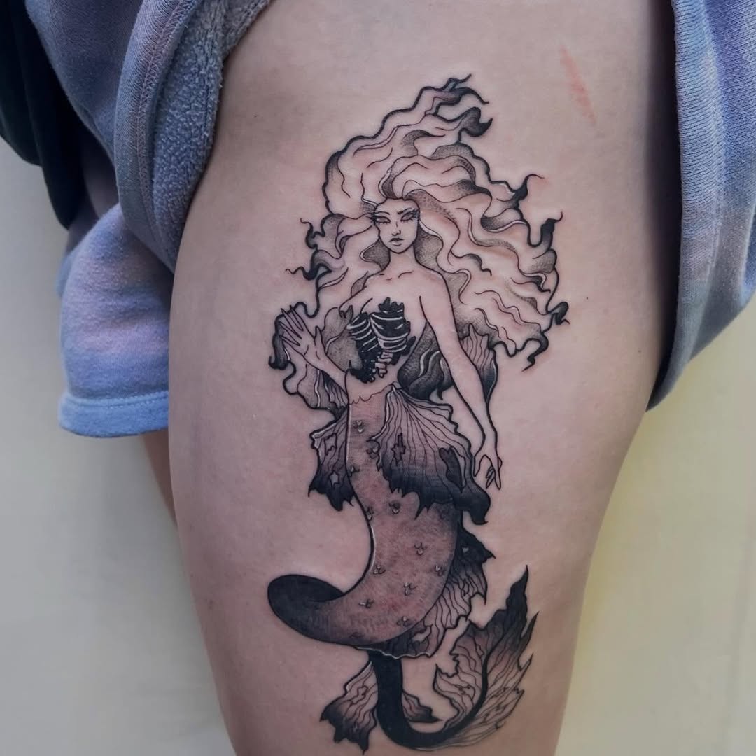 Tattoo by @lilacmourningink — black_and_grey, dark_realism