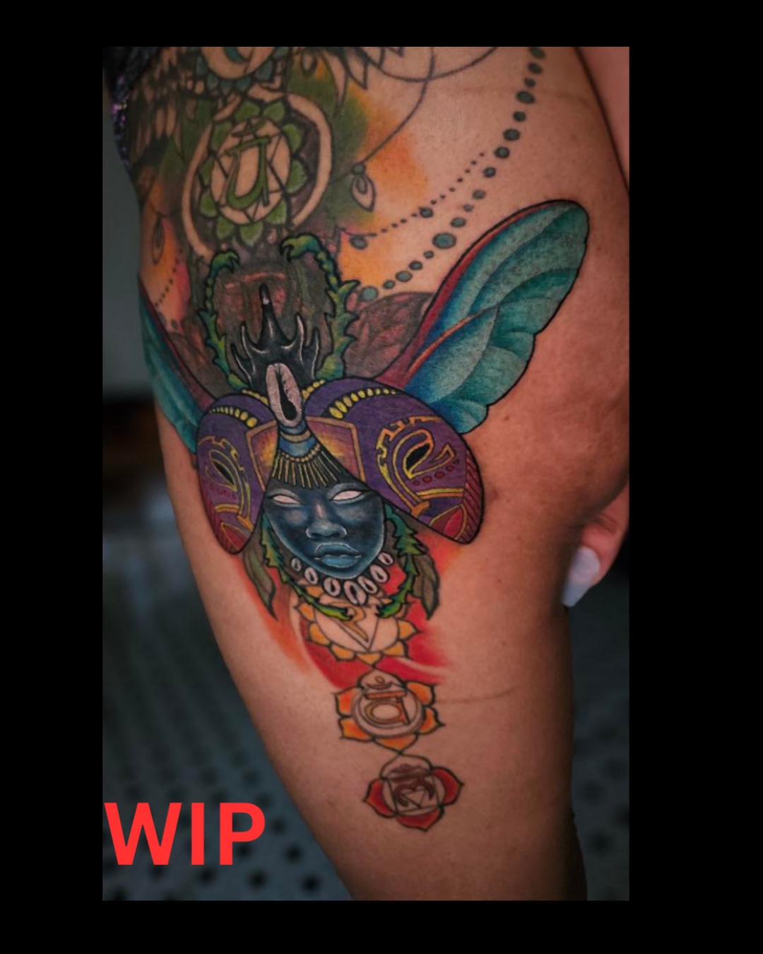 Mask with feathers American traditional tattoo on the thigh by ๐๐๐๐