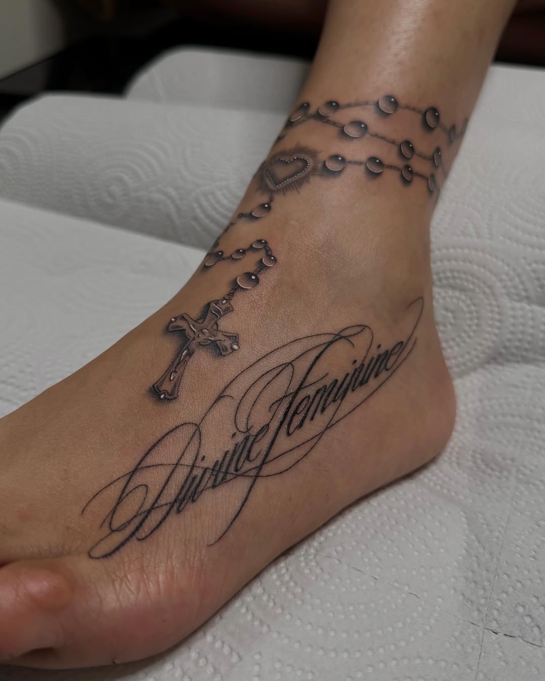 Tattoo by @artdenoche — lettering_script, black_and_grey