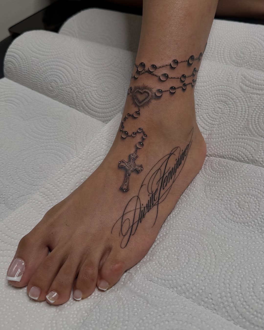 Tattoo by @artdenoche — lettering_script, black_and_grey