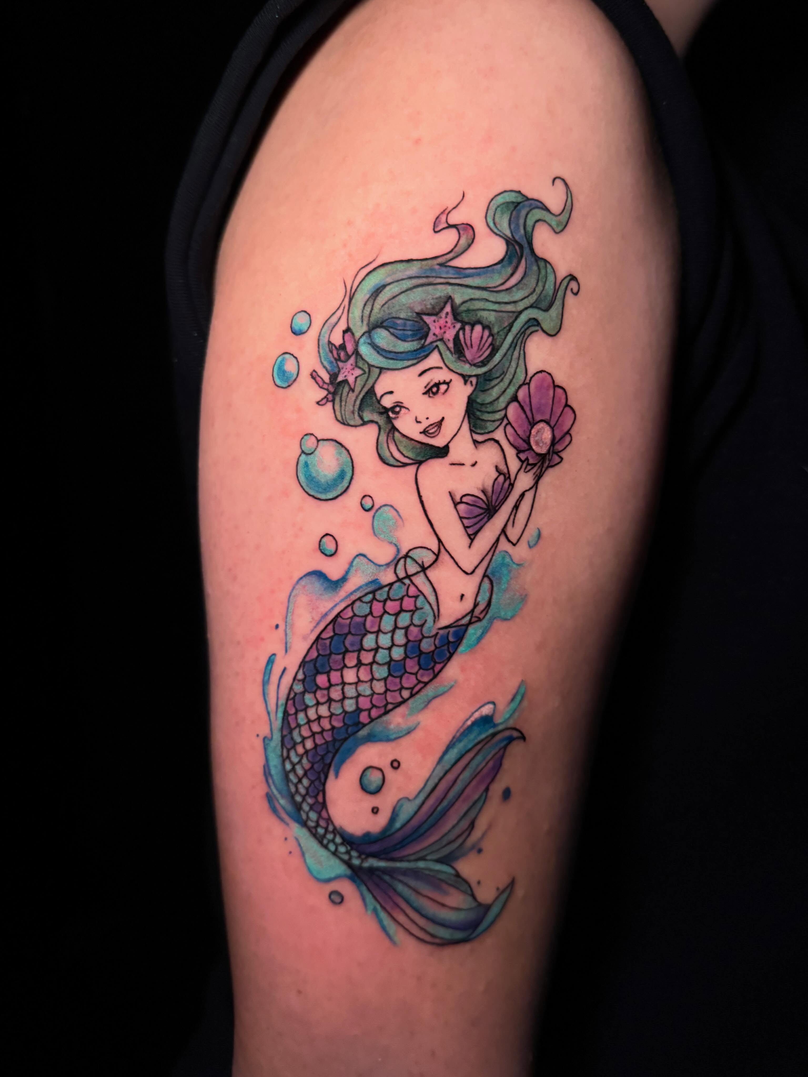 Mermaid watercolor tattoo on the upper arm by π΅ππππππ¦π€