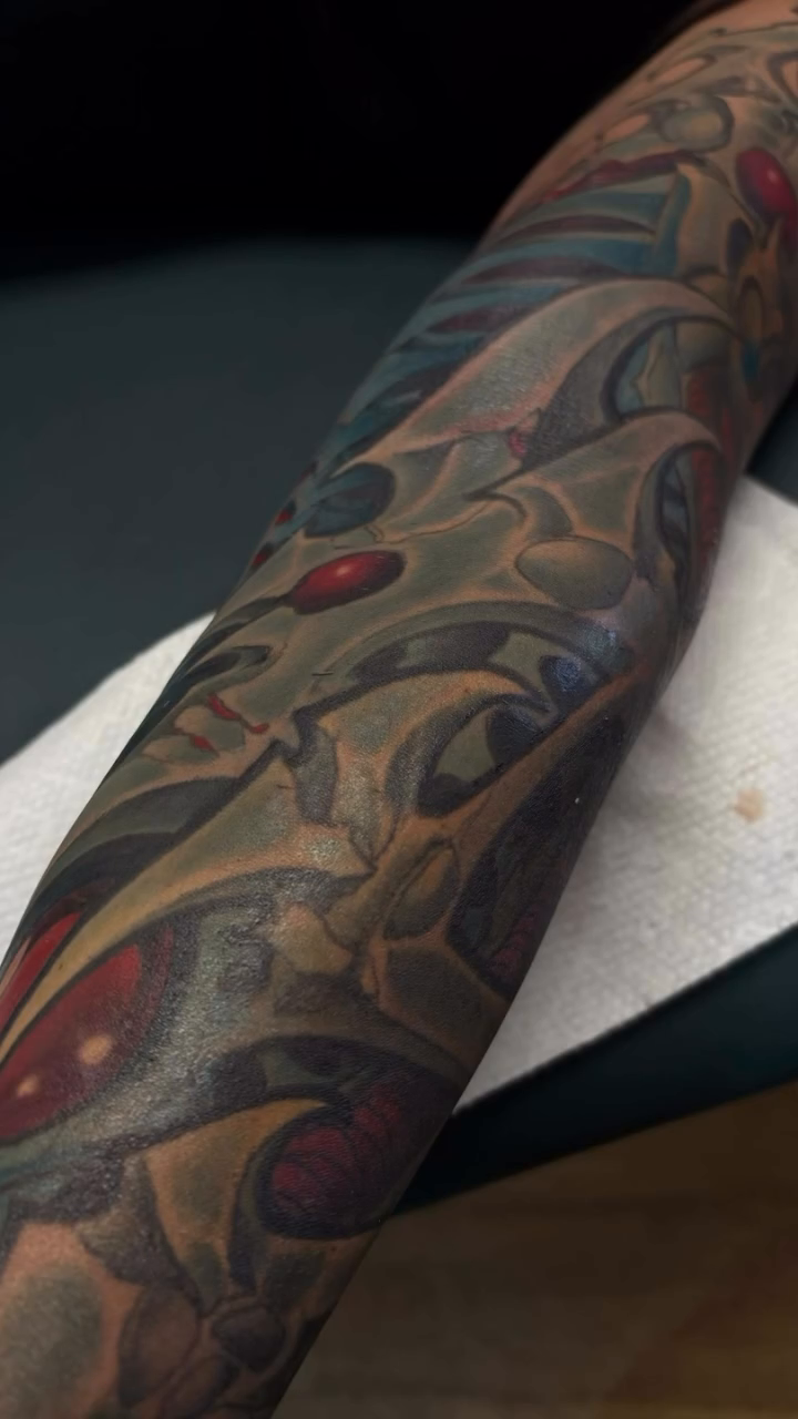 Biomechanical arm tattoo realism tattoo by Rene Chavira