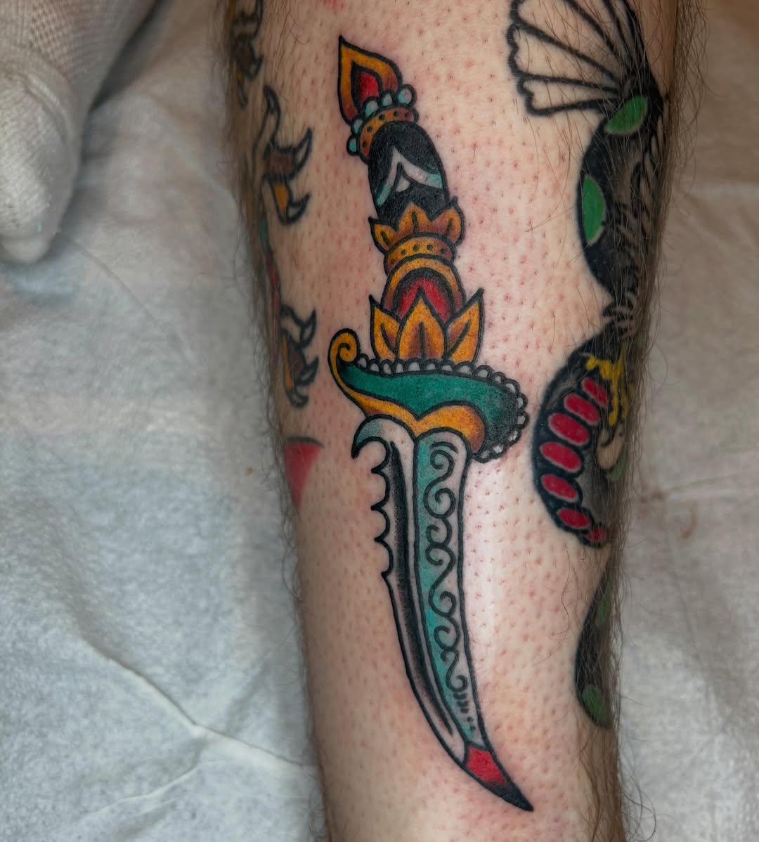 Knife American traditional tattoo on the forearm by Casey Lewis - Tattoo Artist, Cleveland Ohio
