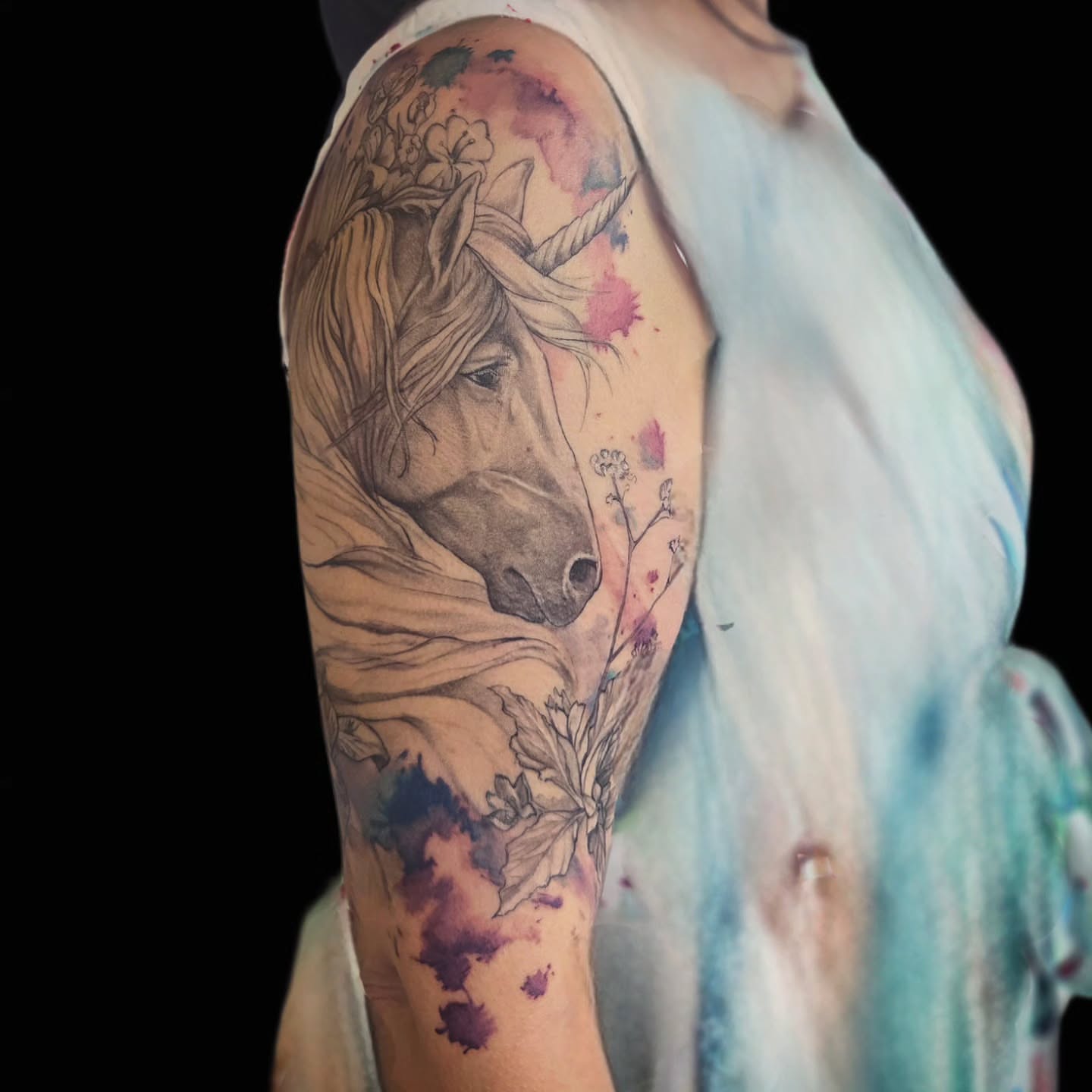Unicorn realism tattoo on the forearm by Molly DeSmedt