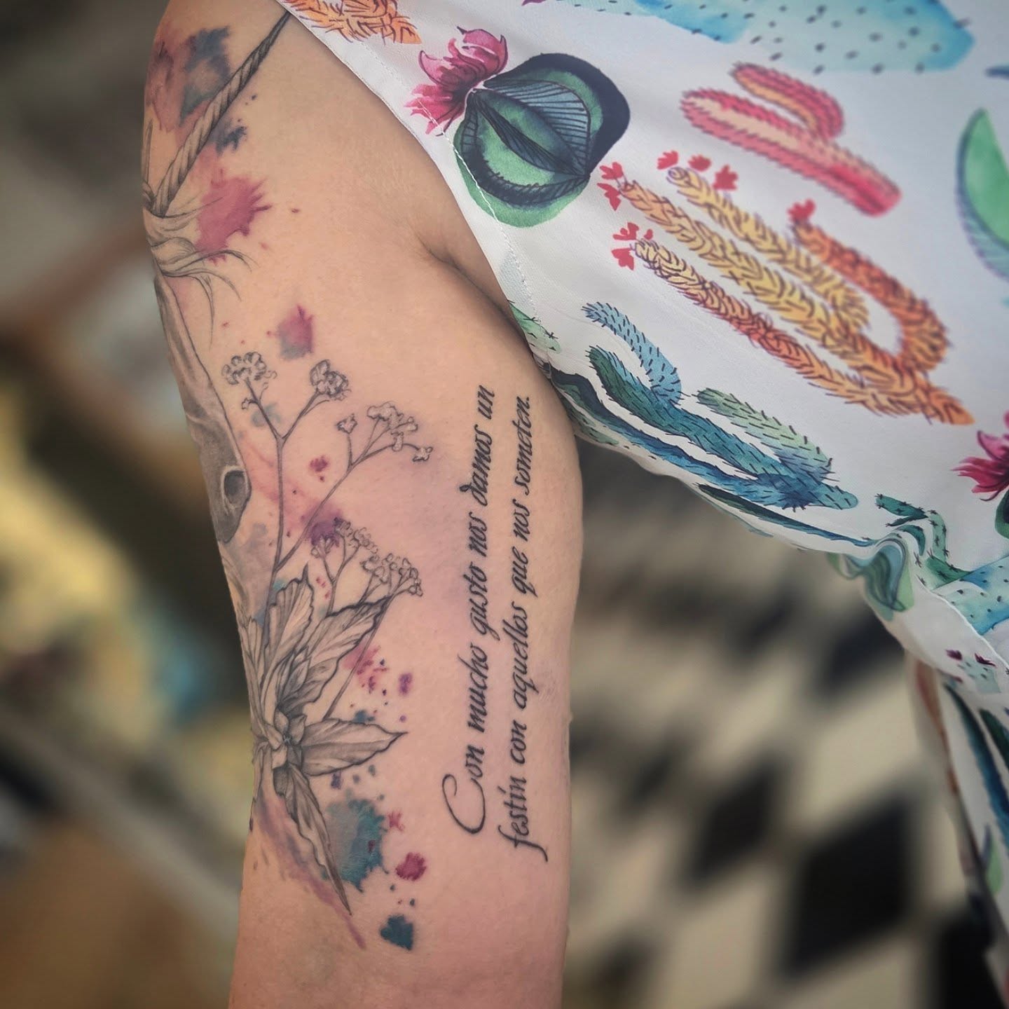 Watercolor floral design watercolor tattoo on the forearm by Molly DeSmedt