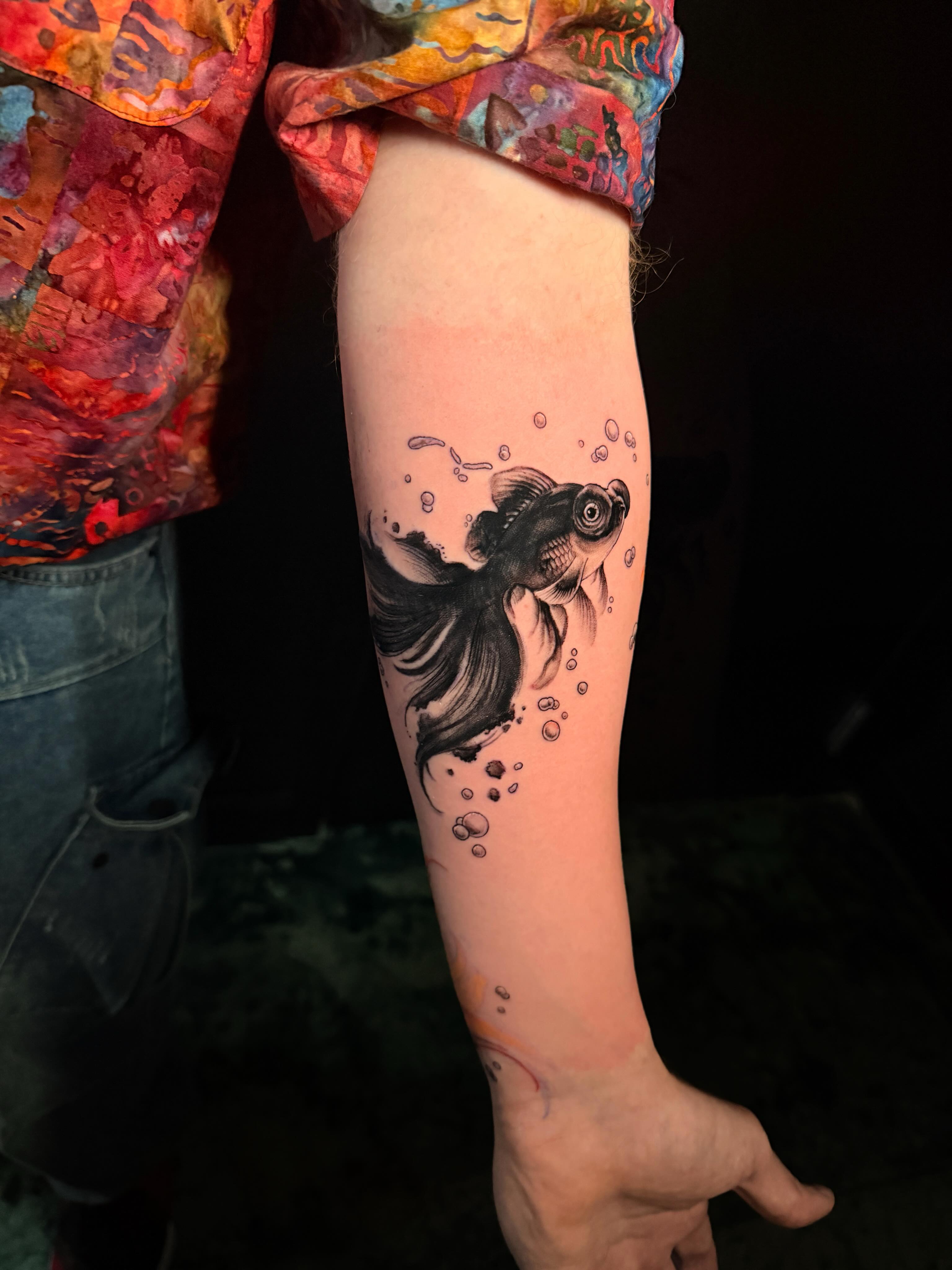 Goldfish realism tattoo on the forearm by Violet Michelle Williams, Charlotte, North Carolina