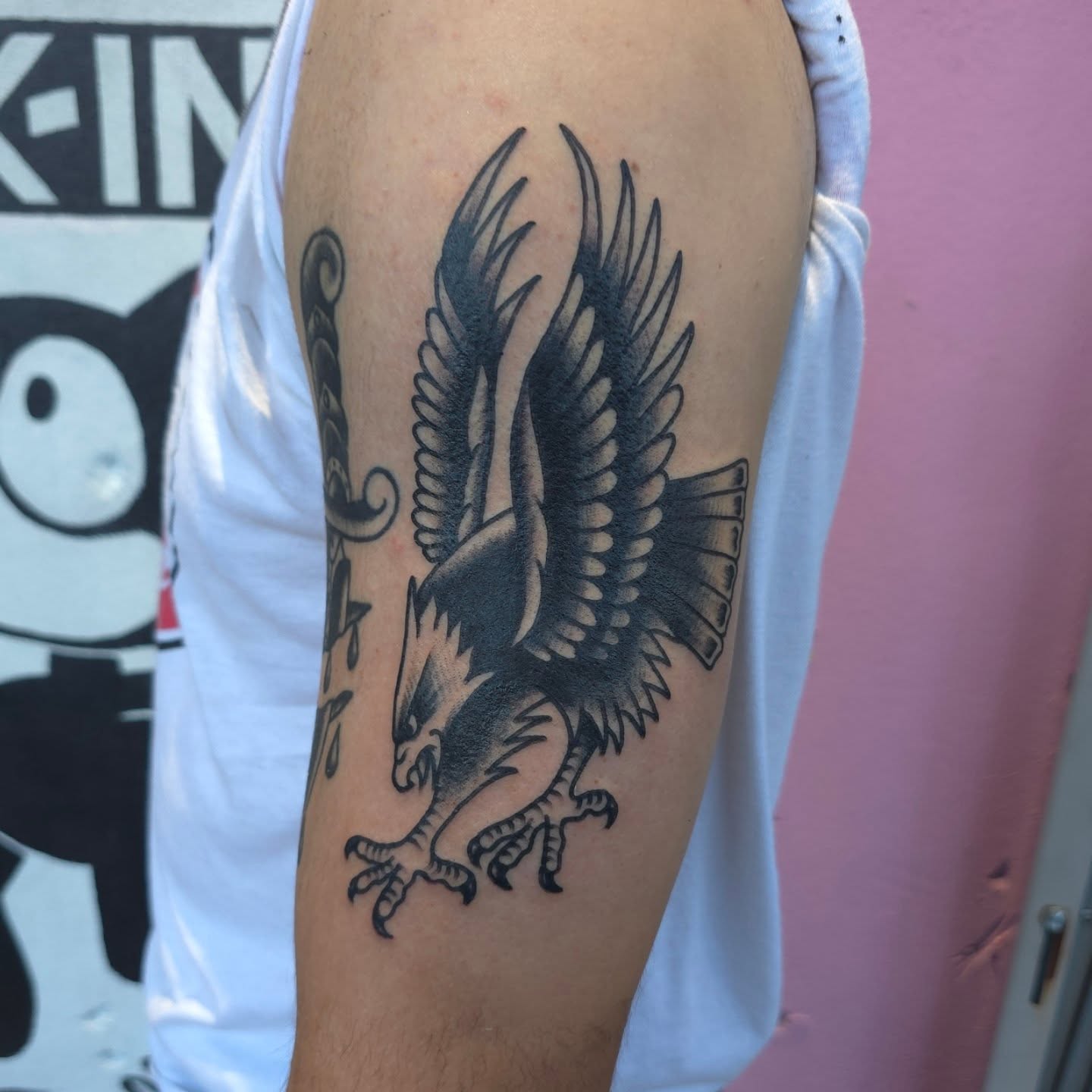 Eagle American traditional tattoo on the forearm by Jared Green