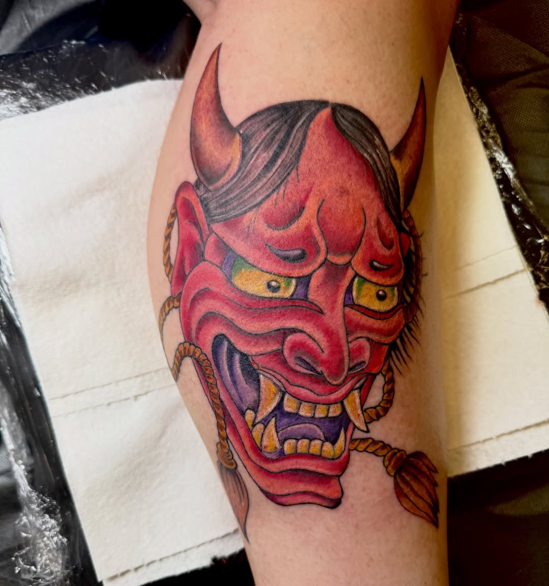 Demon mask japanese irezumi tattoo on the forearm by Jerry Thomas
