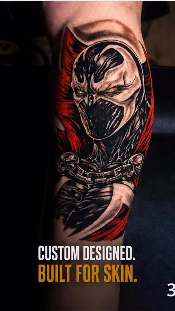 Spawn character dark art tattoo on the upper arm by Shake_tatts