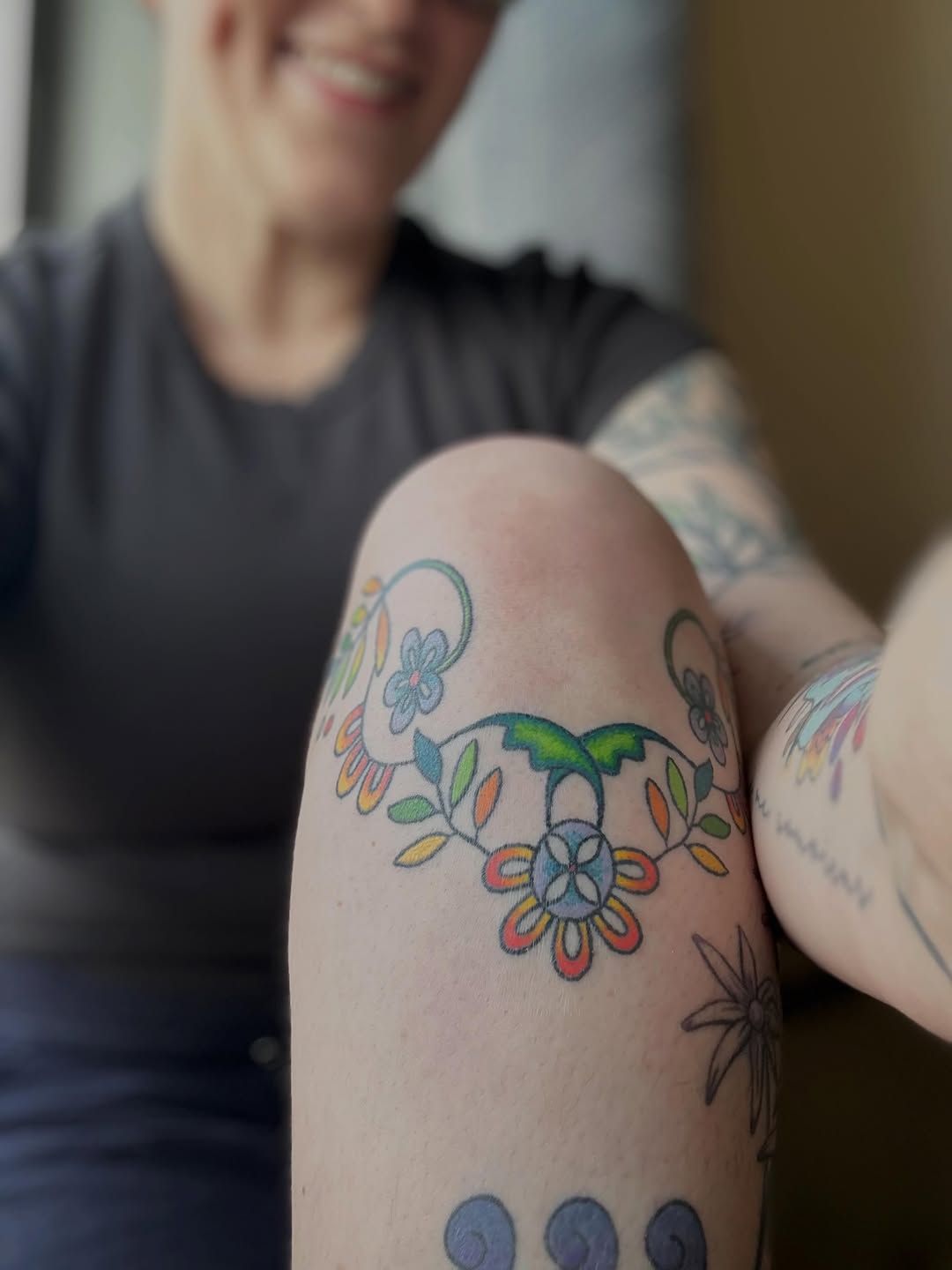 Floral vine neo-traditional tattoo on the forearm by Emma D
