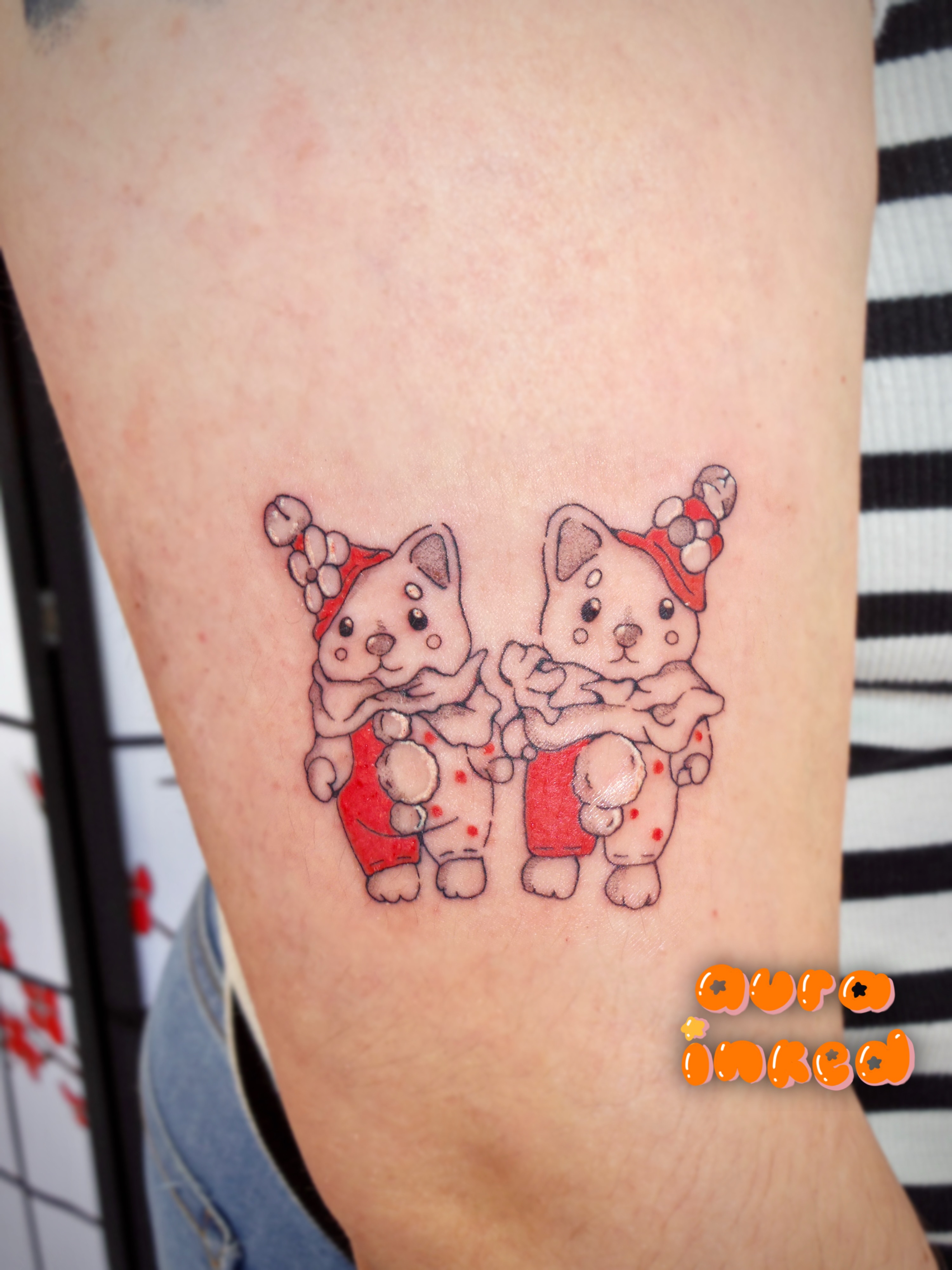 Two cats dotwork tattoo on the thigh by Delly ⌯
