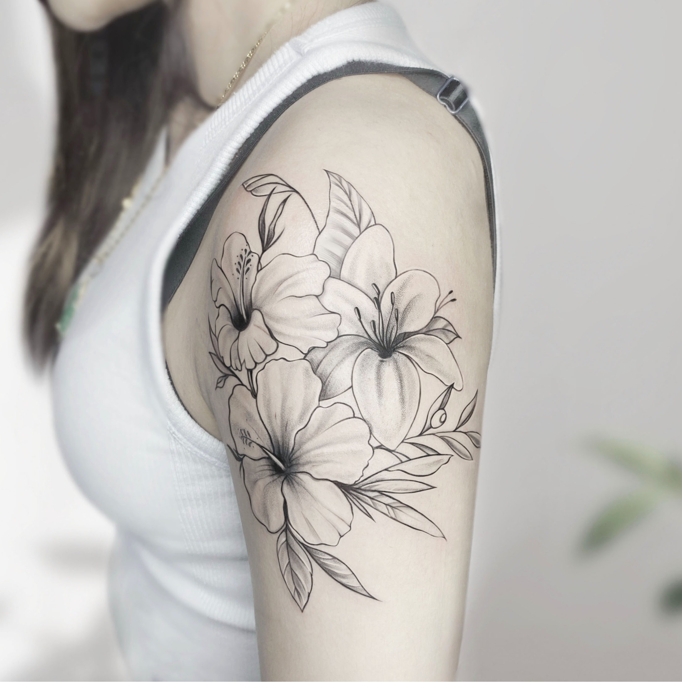 Floral bouquet black and grey tattoo on the shoulder by R o s e