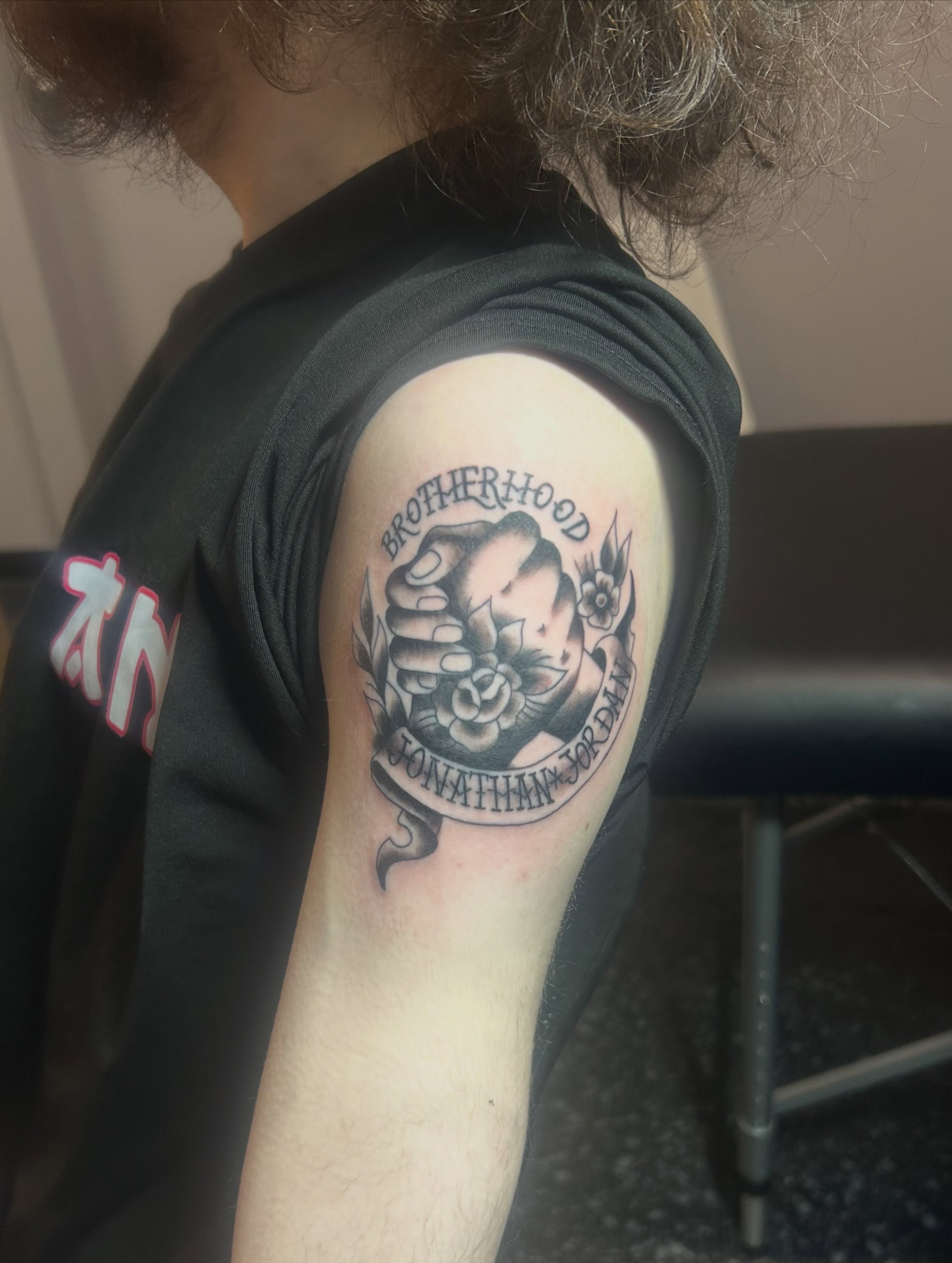 Brotherhood American traditional tattoo on the shoulder by Jamie Winn