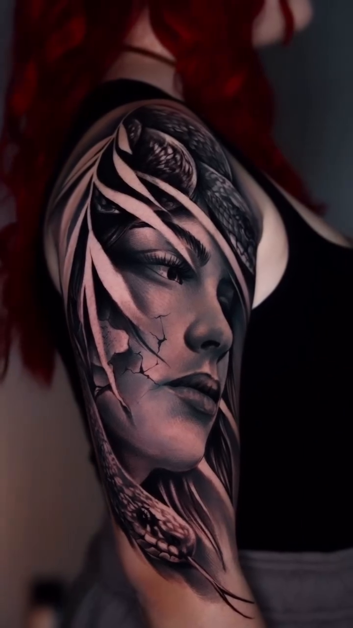 Woman with snake realism tattoo by Andres García Baeza