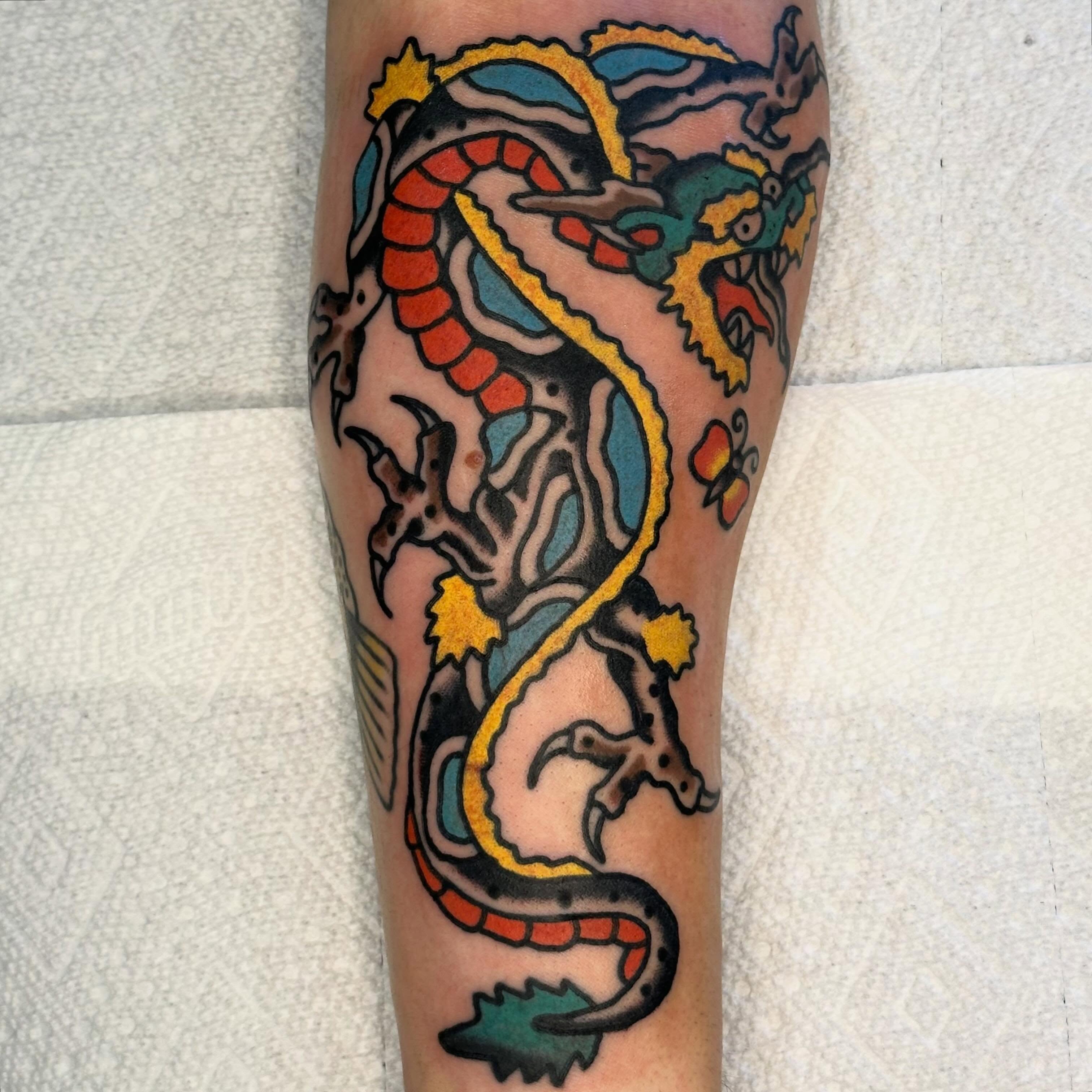 Dragon American traditional tattoo on the forearm by Rob, Nashville, Tennessee
