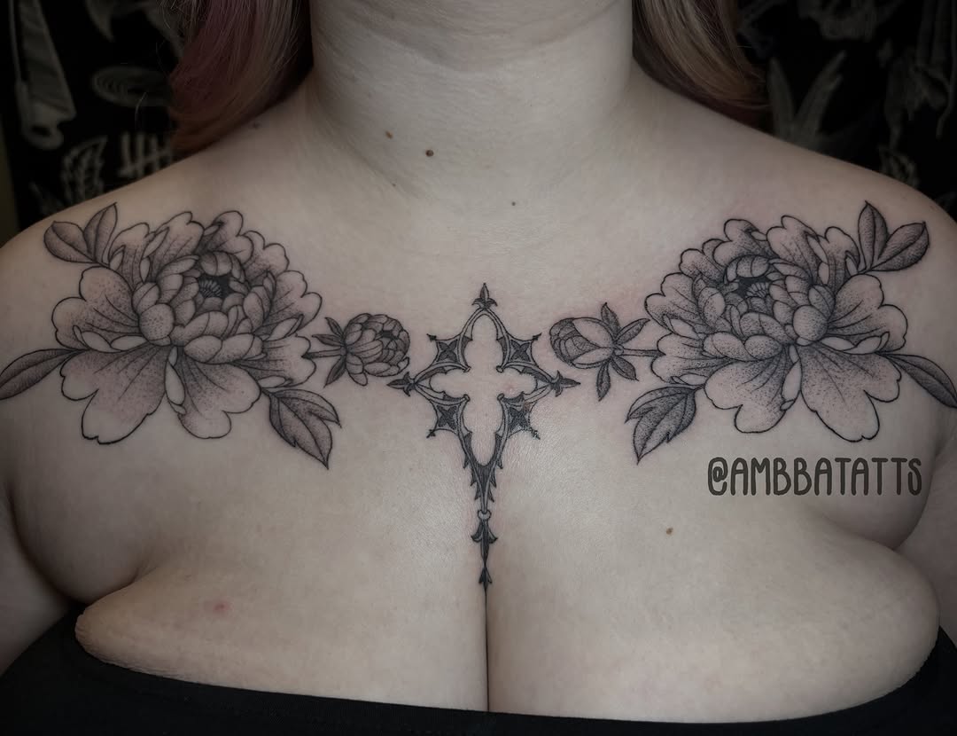 Cross and flowers geometric tattoo on the chest by amber brady, Brunswick, Ohio