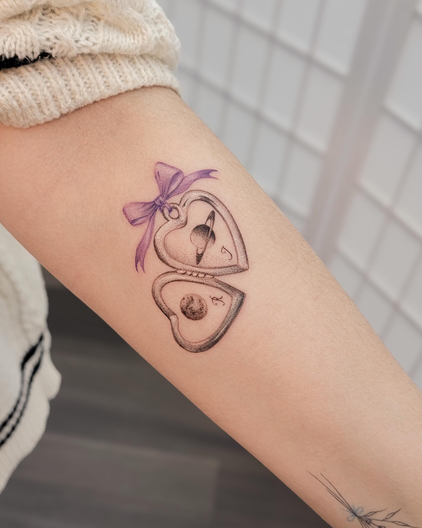 Heart lock and key black and grey tattoo on the forearm by Koko