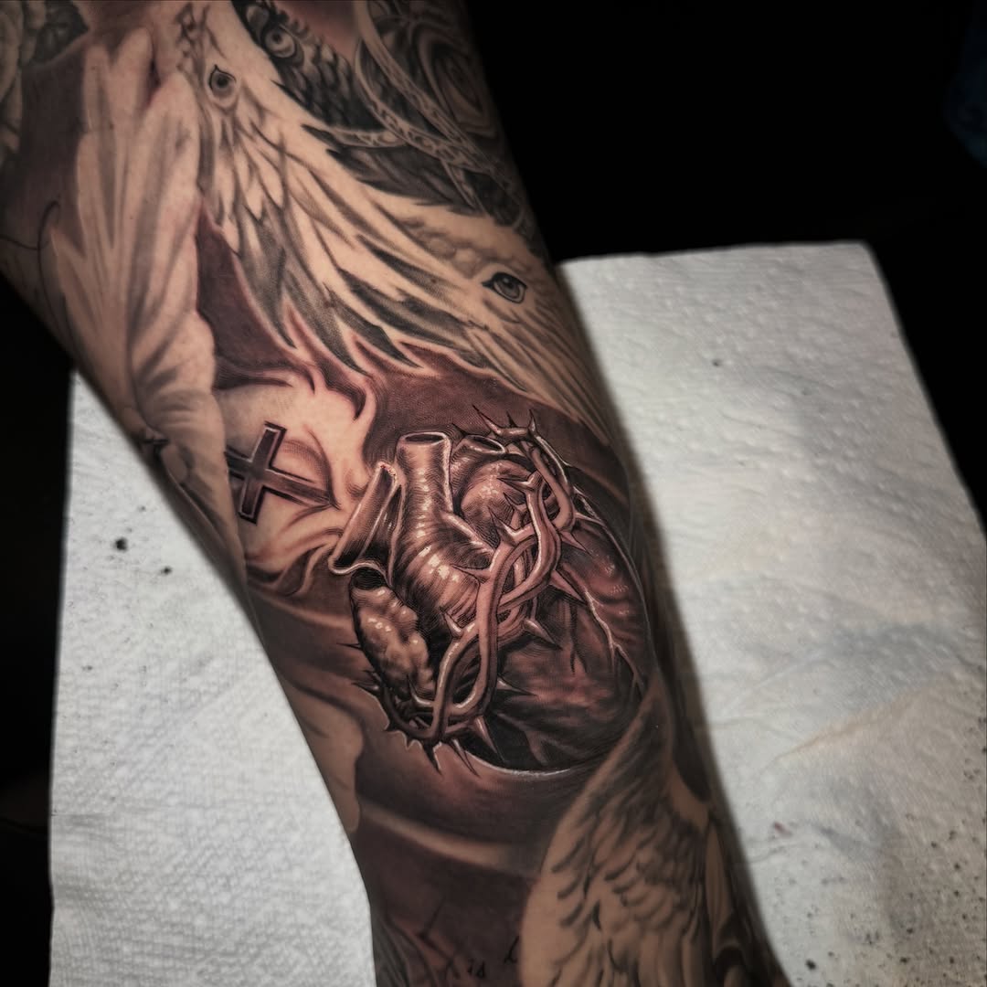 Realism tattoo on the forearm by Jake Fujimura
