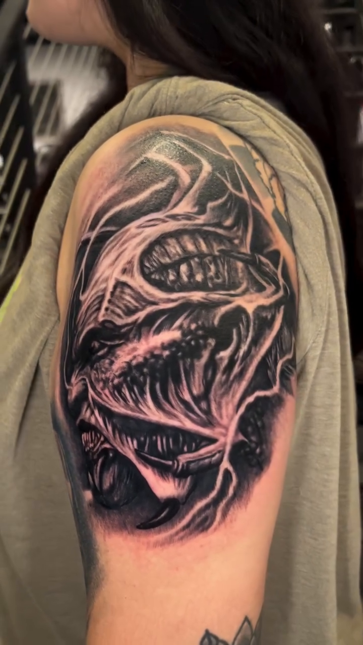 Tattoo by @jessef_tattoo — dark_realism, black_and_grey