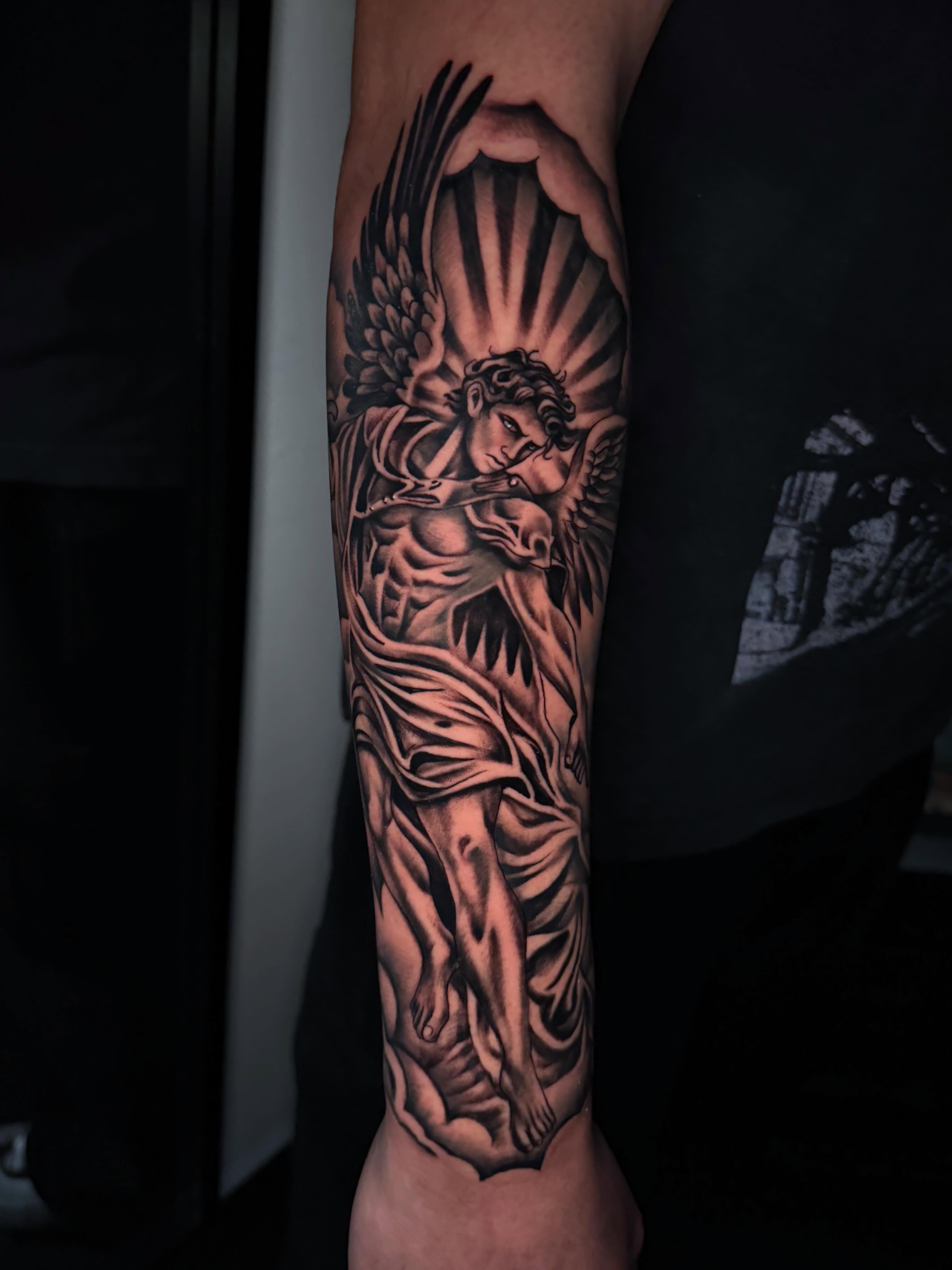 Angelic figure realism tattoo on the forearm by Daero Tattoo, New York, New York