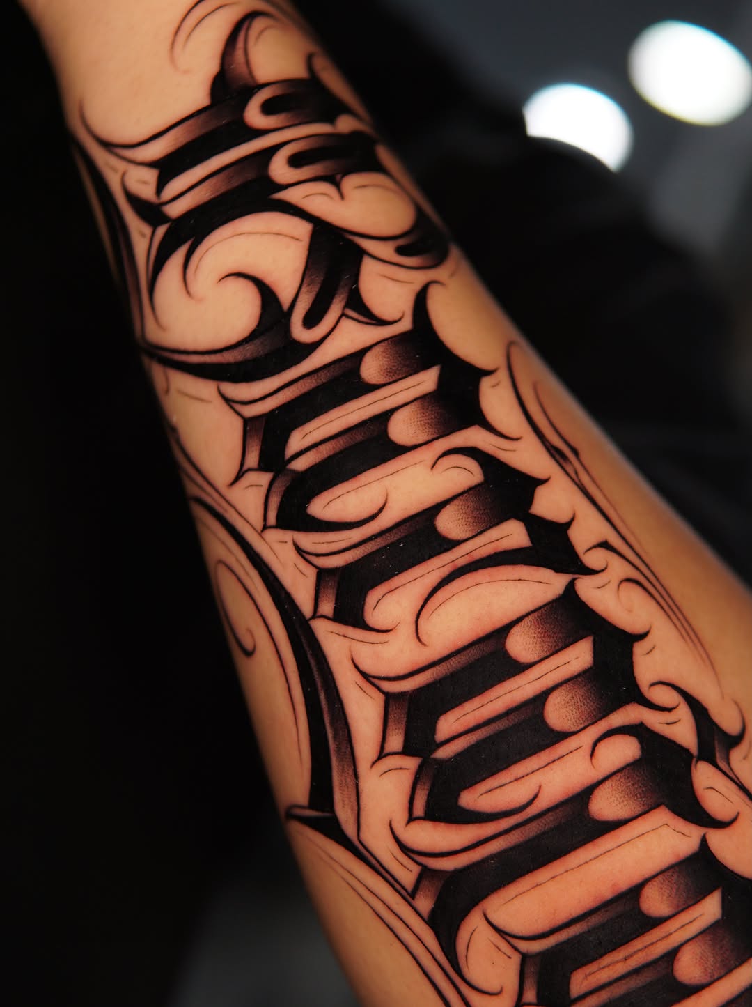 Stylized lettering Chicano tattoo on the forearm by Atlanta Tattoo Artist, Atlanta, Georgia