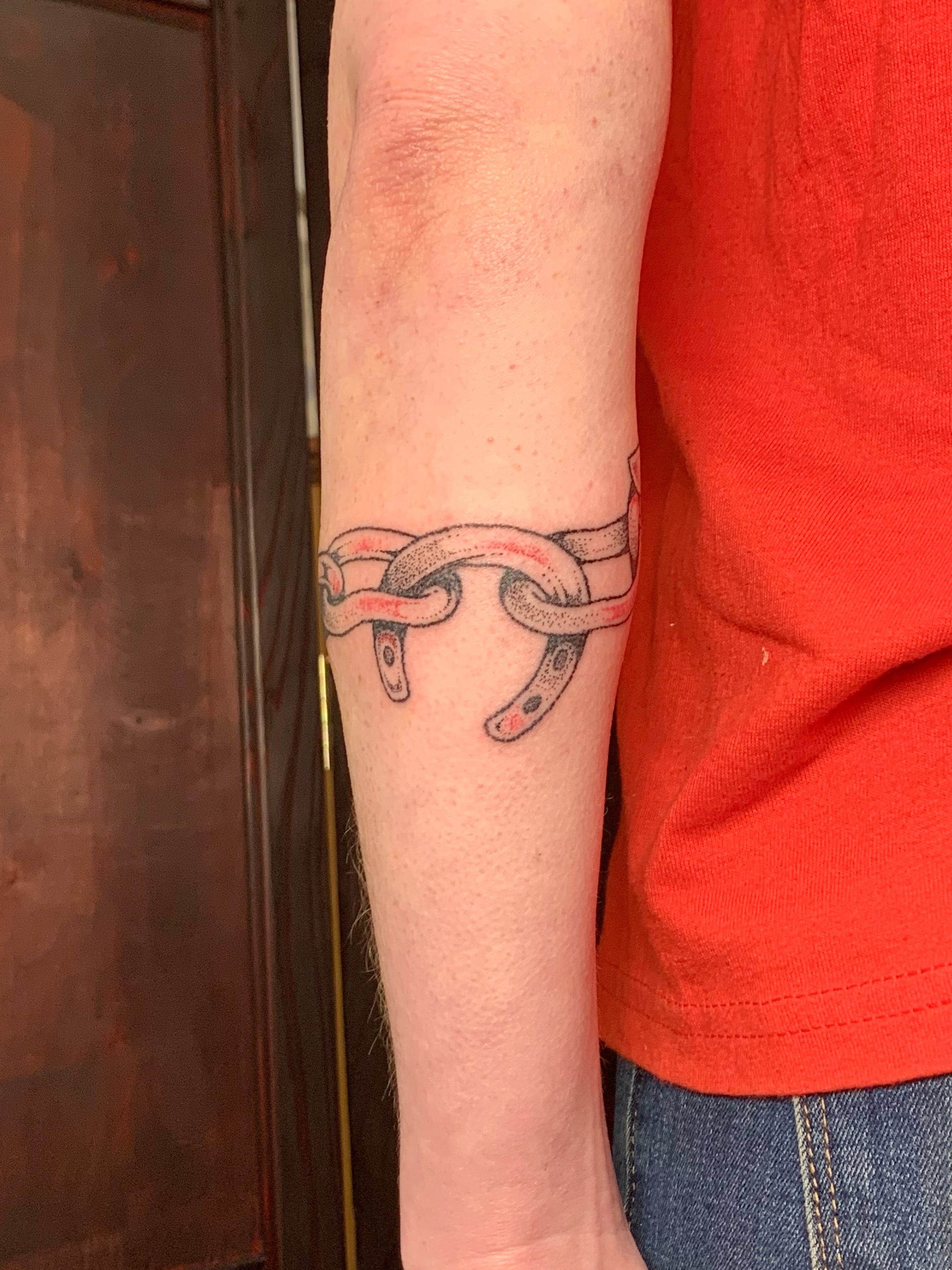 Chain dotwork tattoo on the forearm by Lex Lloyd