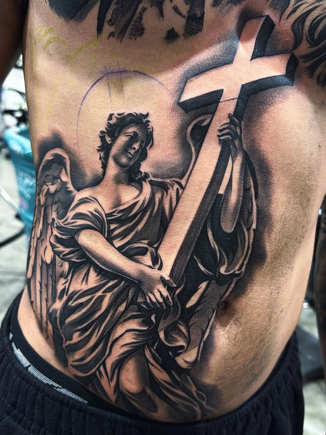Tattoo by @eksoe_ — realism, black_and_grey