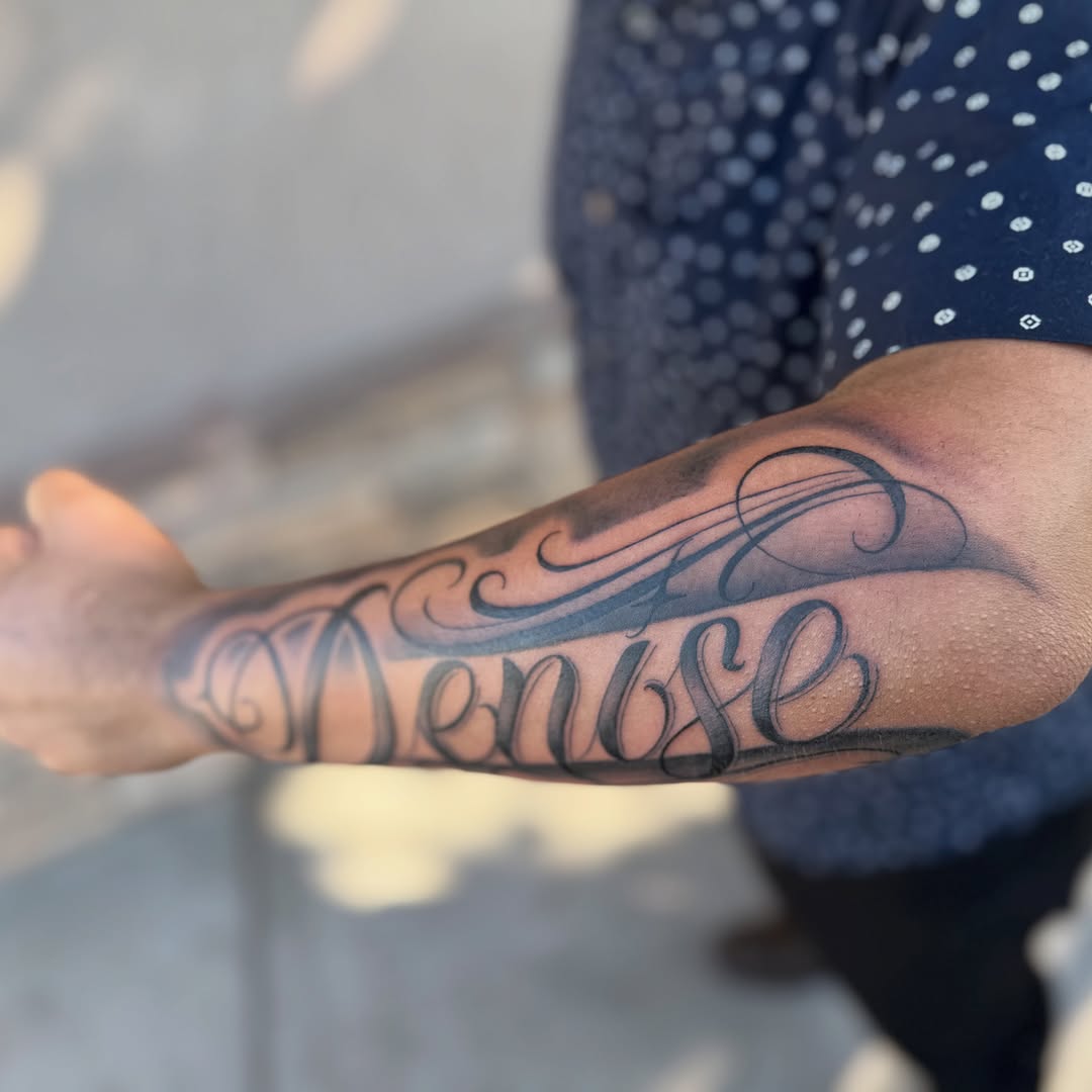 Mensense lettering script tattoo on the forearm by Faith Lopez