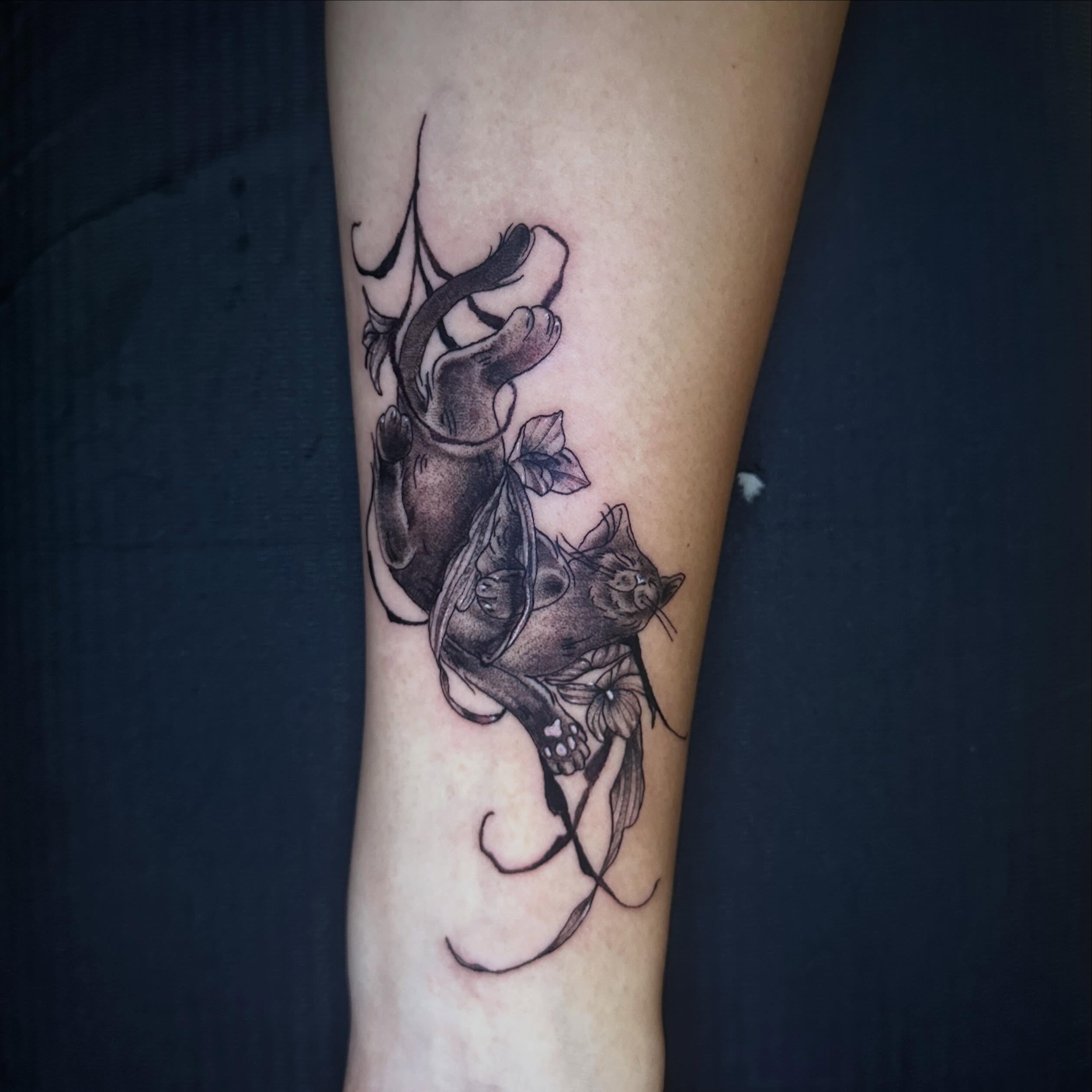 Cat and heart realism tattoo on the forearm by Sierra