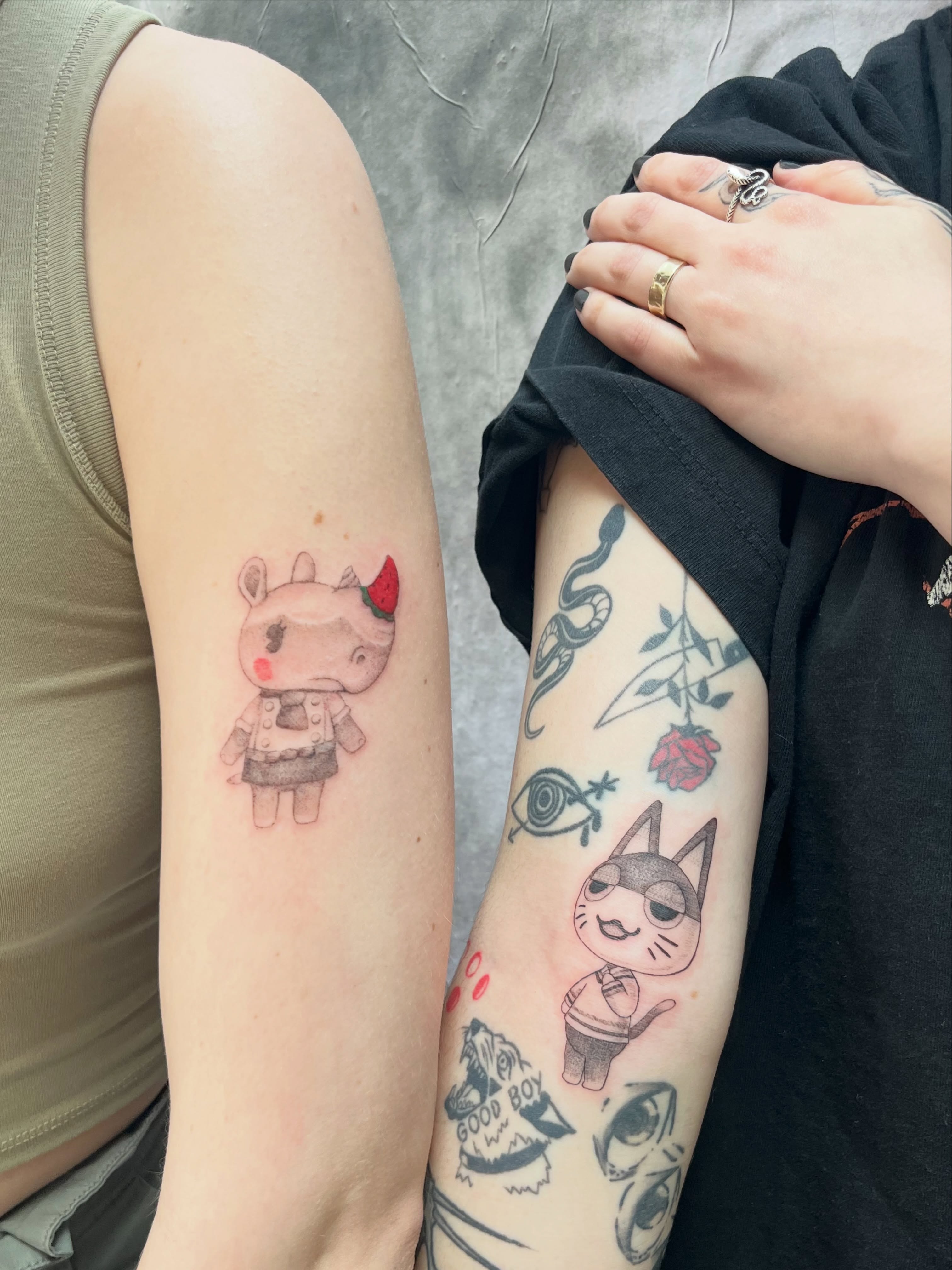 Animal characters anime tattoo on the forearm by Kyra Monterrosa