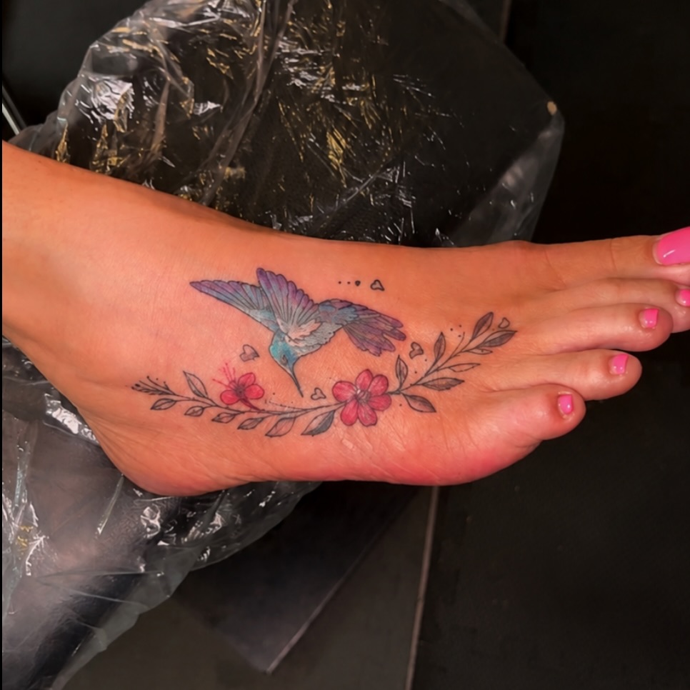 Hummingbird and flowers dotwork tattoo on the foot by Cece, Las Vegas, Nevada